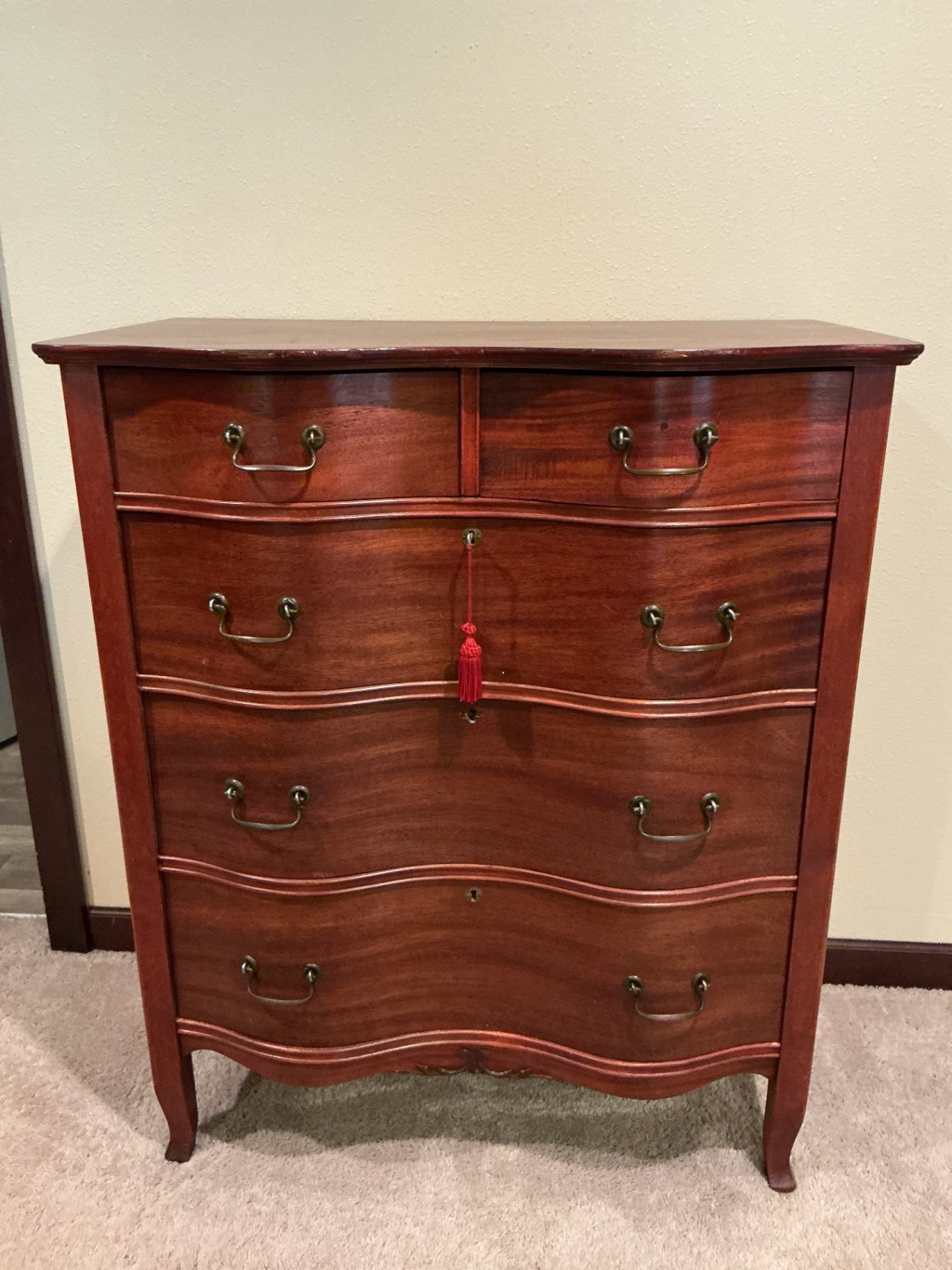 Vintage curved-front dresser with brass hardware - image 1 of 8