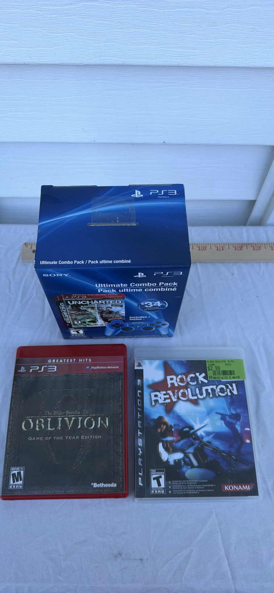 USED Sony PlayStation 3 Ultimate Combo Pack and PS3 Game Titles - image 1 of 7