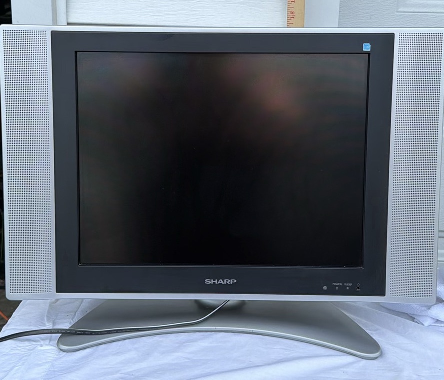 Sharp Flat-Screen Television with Stand - image 1 of 3