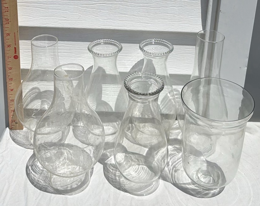 Seven Clear Vintage Glass Lamp Chimneys and Shades - image 1 of 5