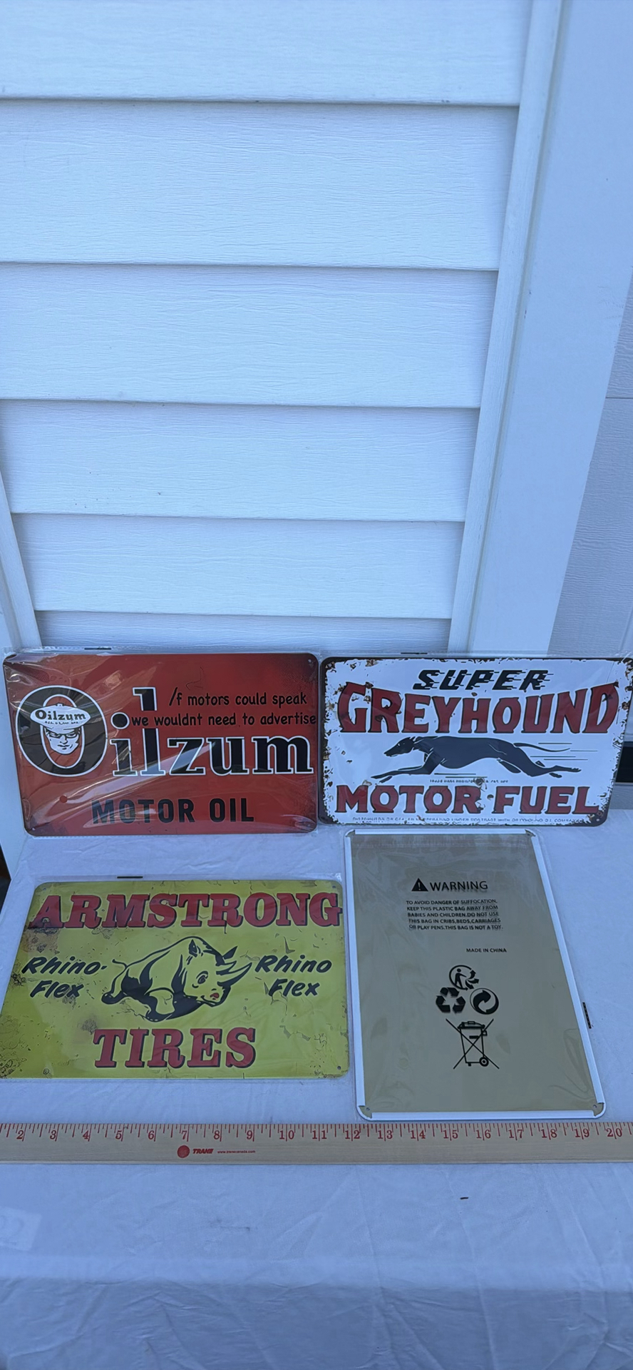 Four Vintage-Style Automotive Advertising Metal Signs - Oilzum, Greyhound, Armstrong, Sipo - image 2 of 3