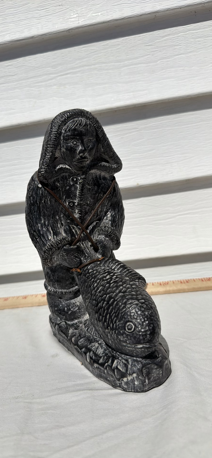 Nunavut Inuit Soapstone Carved Figure Holding a Fish Sculpture - image 1 of 7