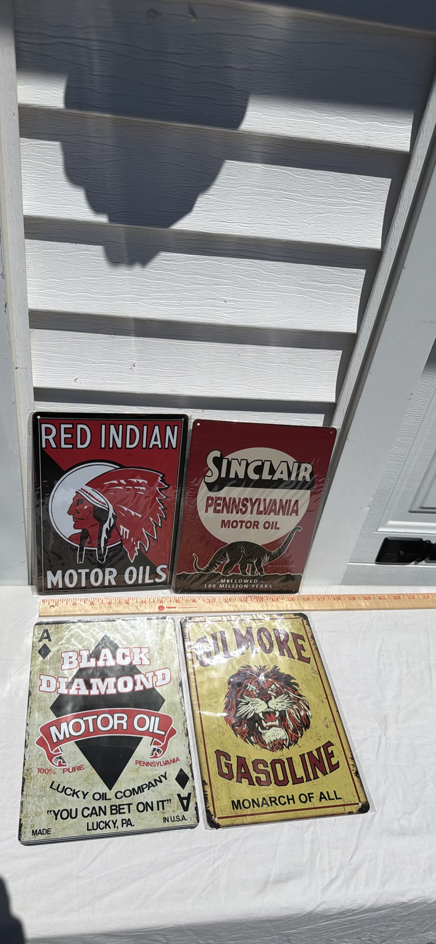 Four Vintage-Style Oil and Gas Advertising Metal Signs Incl. RED INDIAN - image 1 of 3