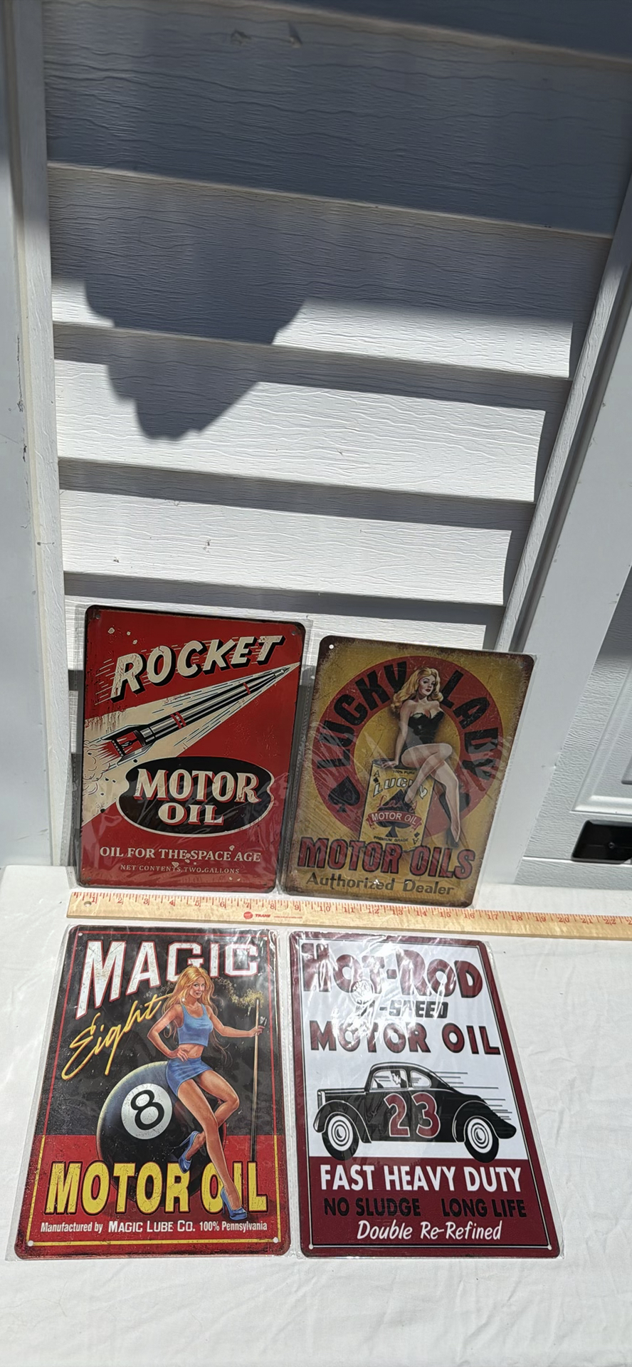 Four Vintage-Style Motor Oil Metal Signs - image 1 of 3