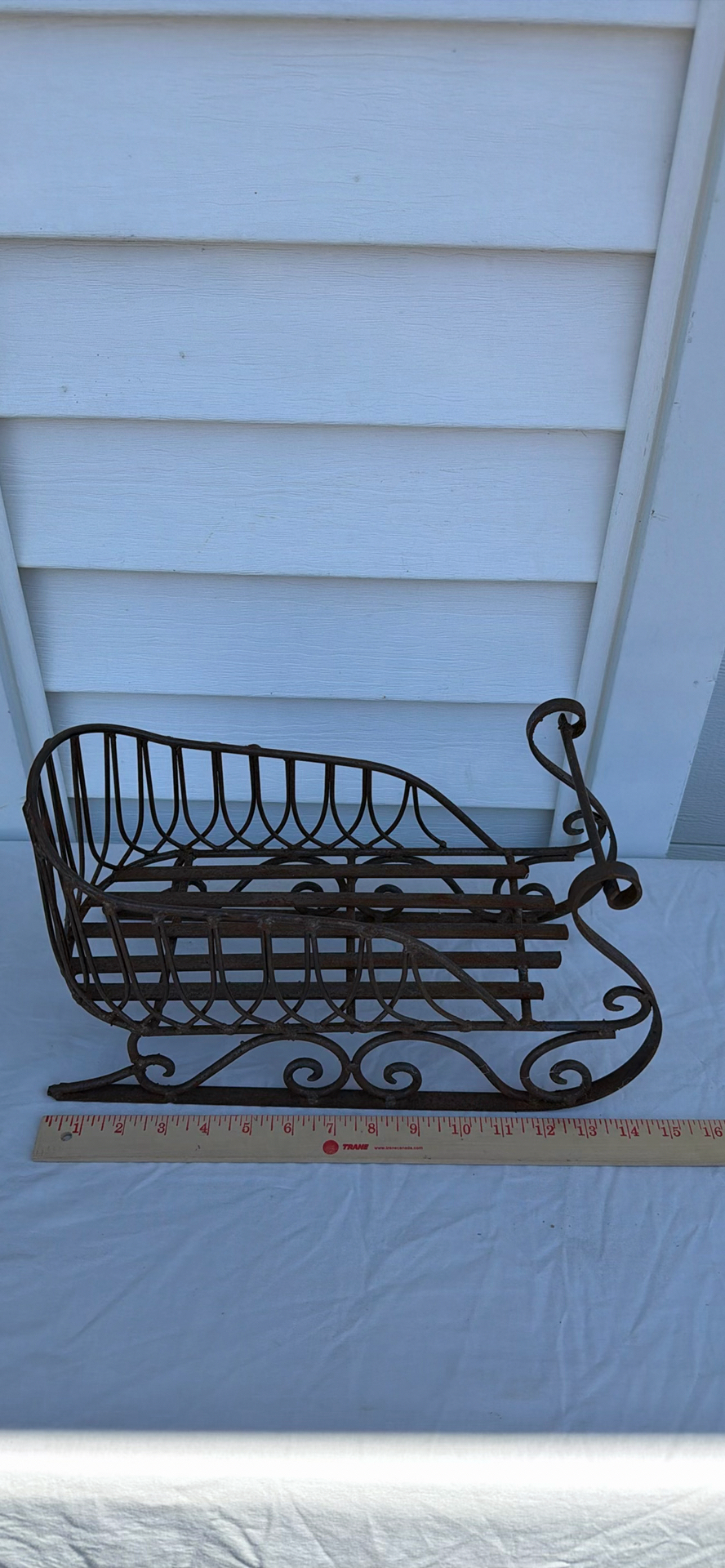 Two Metal Sleigh-Shaped Wire Baskets - image 1 of 8
