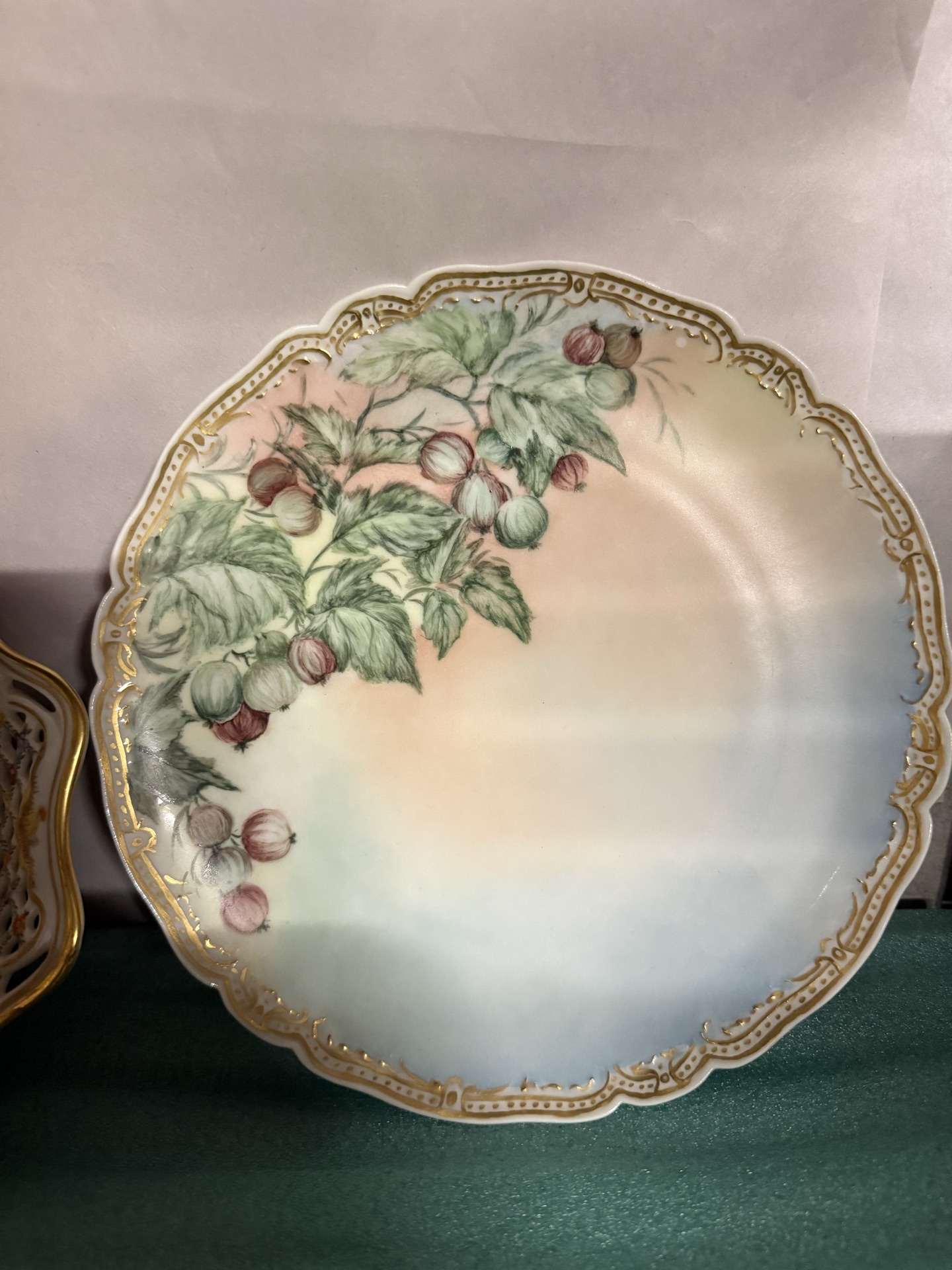 Set of four decorative porcelain plates with floral designs - image 2 of 10