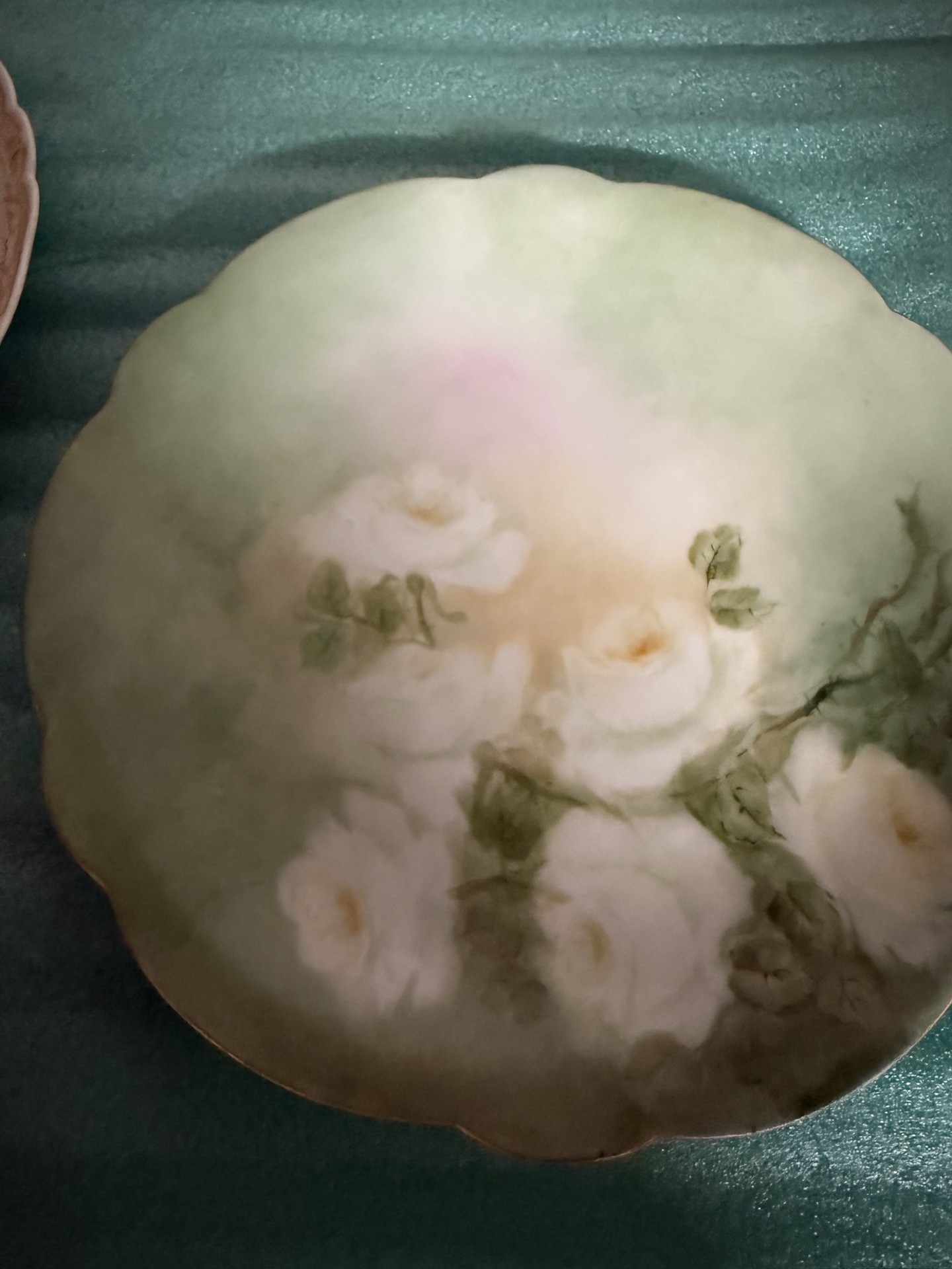 Set of four decorative porcelain plates with floral designs - image 5 of 10