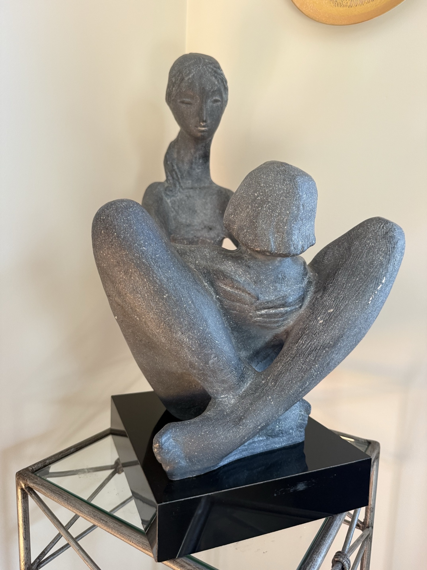 Abstract seated sculpture on metal stand - image 3 of 5