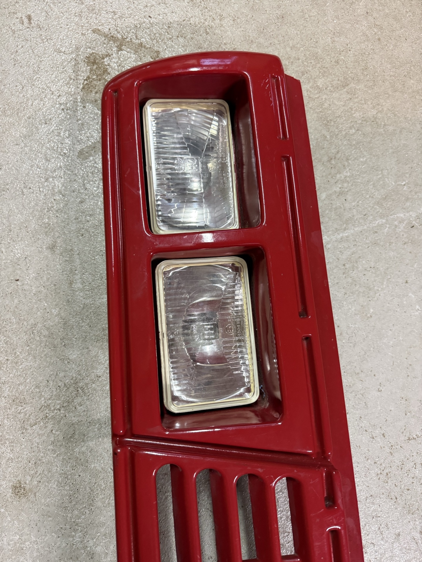 Red front grille with integrated rectangular headlights and related automotive parts - image 3 of 7