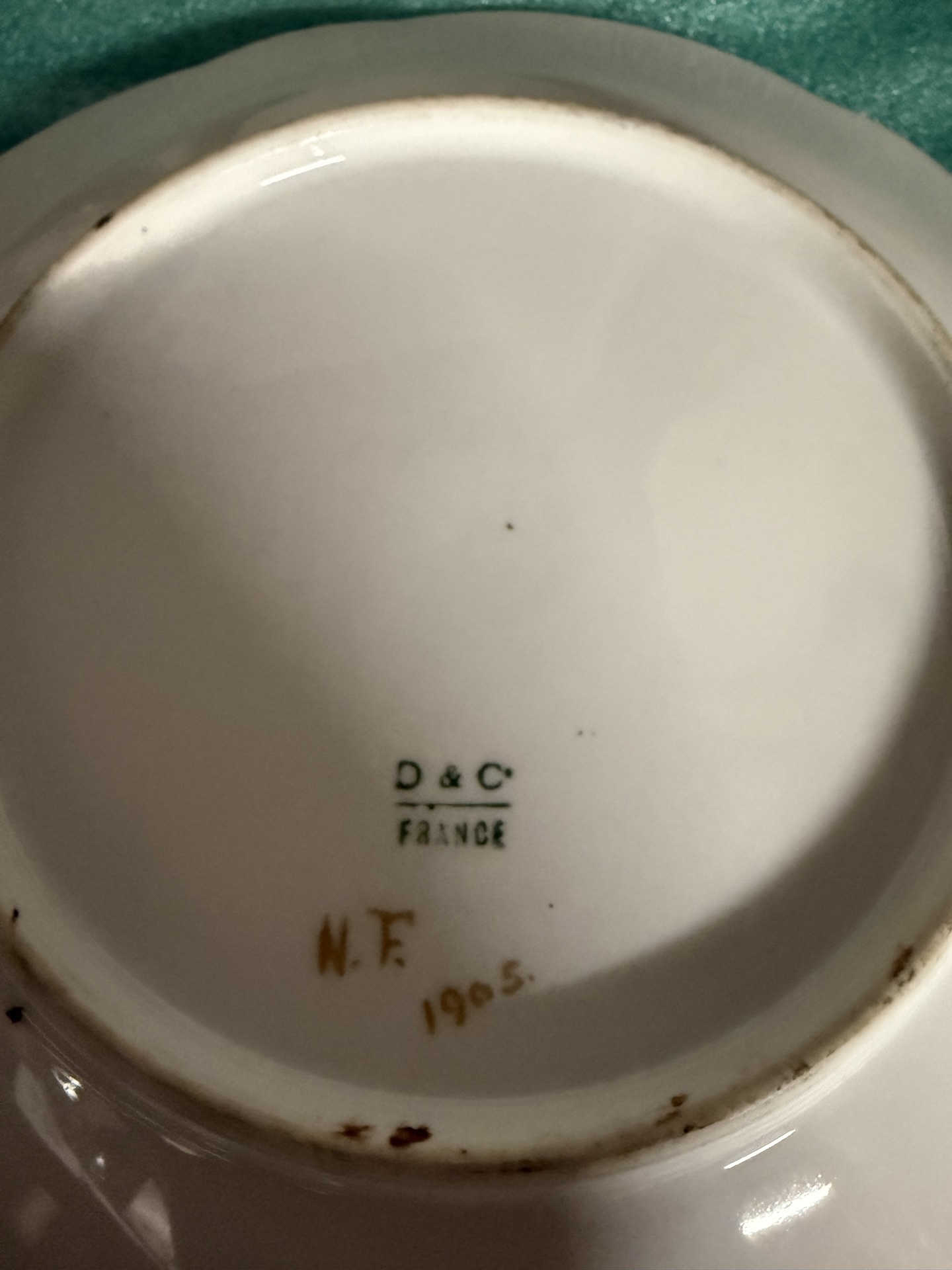 Set of four decorative porcelain plates with floral designs - image 6 of 10