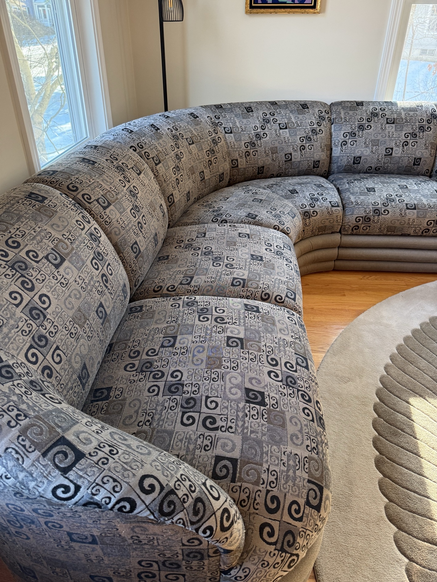 Curved gray patterned sectional sofa - image 1 of 5