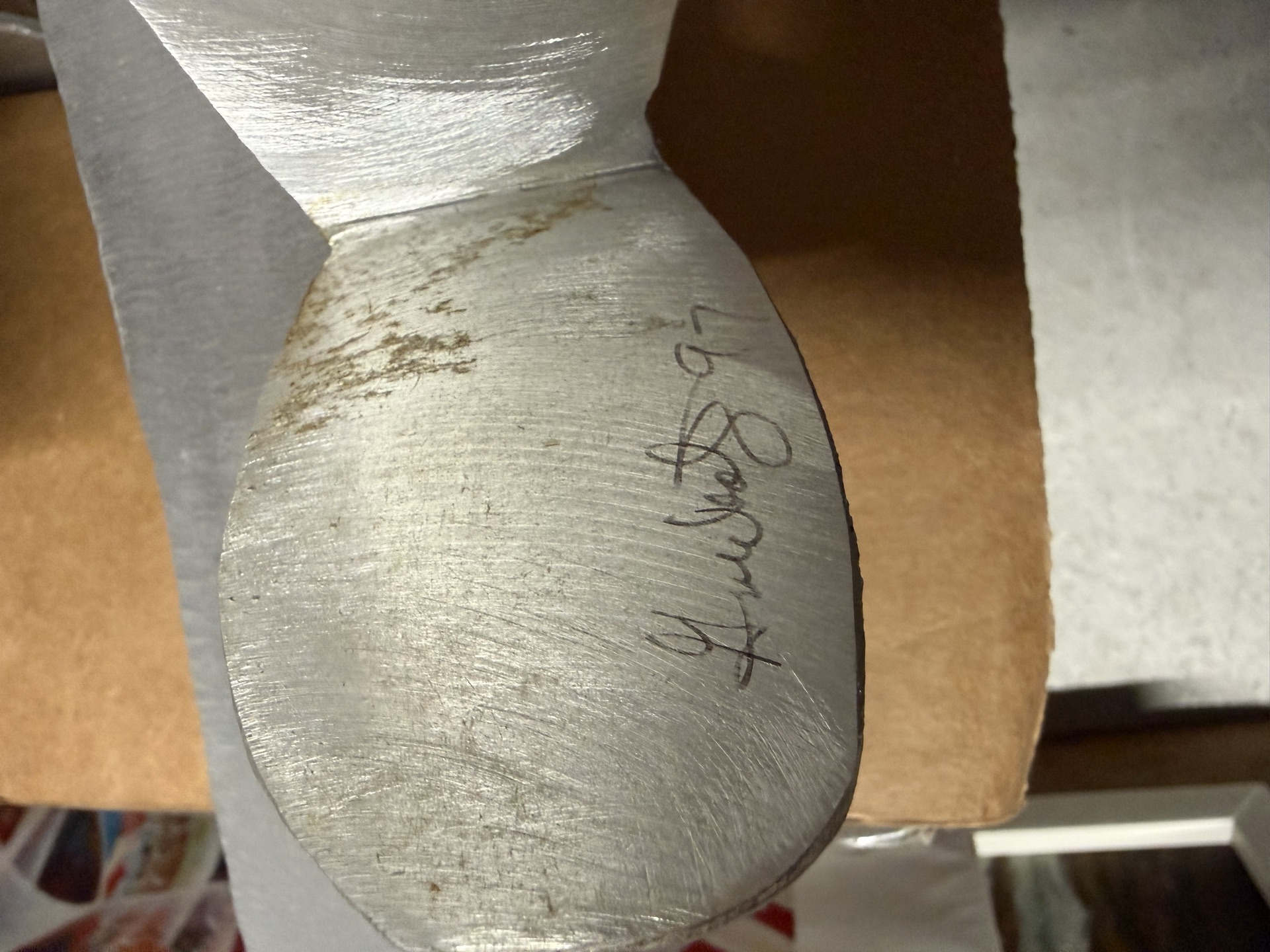 Two metal silhouette sculptures of seated humanoid figures - image 4 of 5