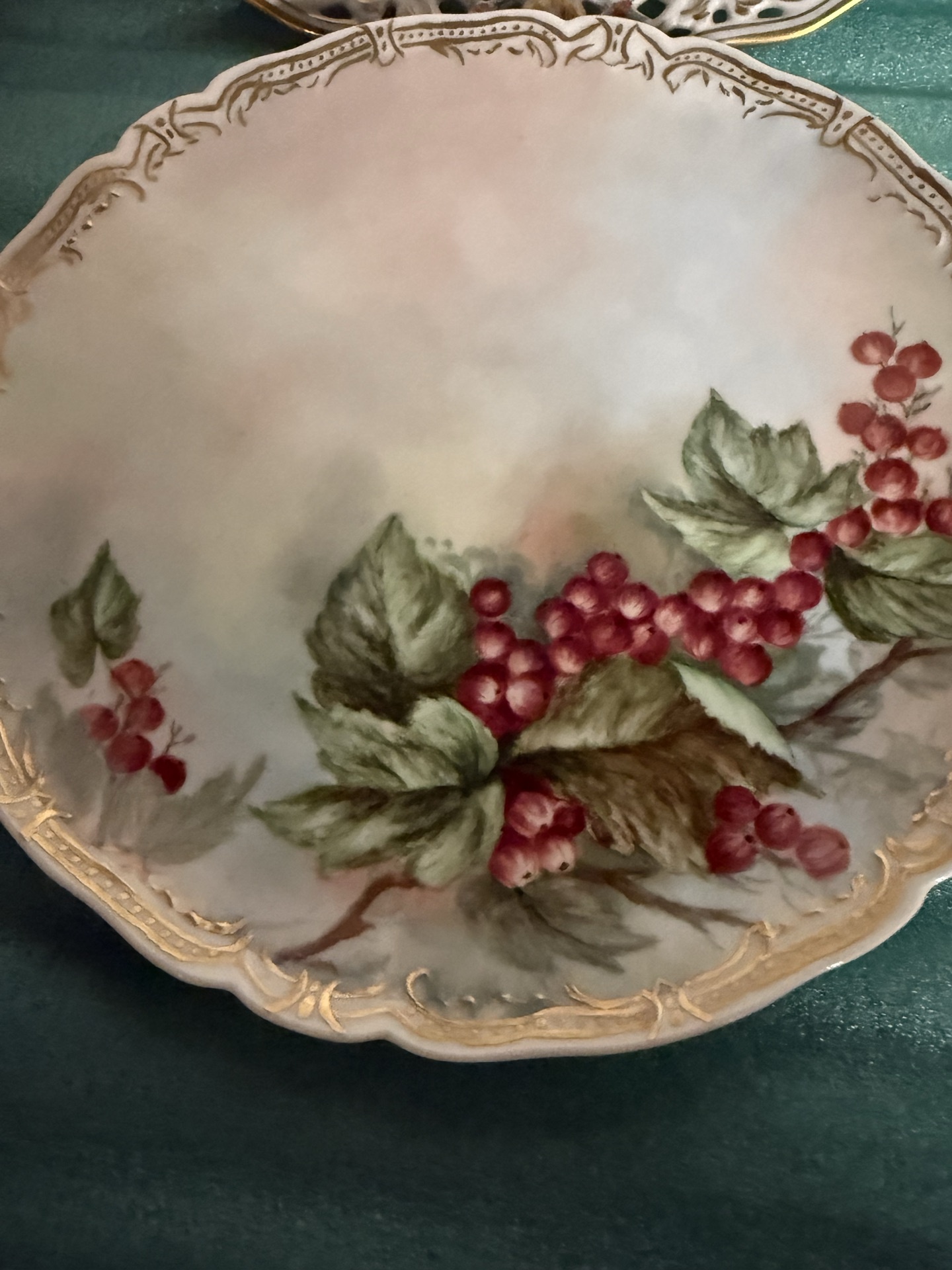 Set of four decorative porcelain plates with floral designs - image 4 of 10