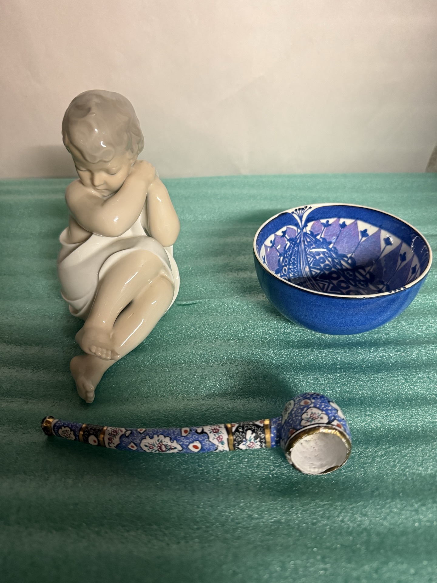 Royal Copenhagen porcelain statue, blue patterned bowl, and cloisonné pipe - image 1 of 5