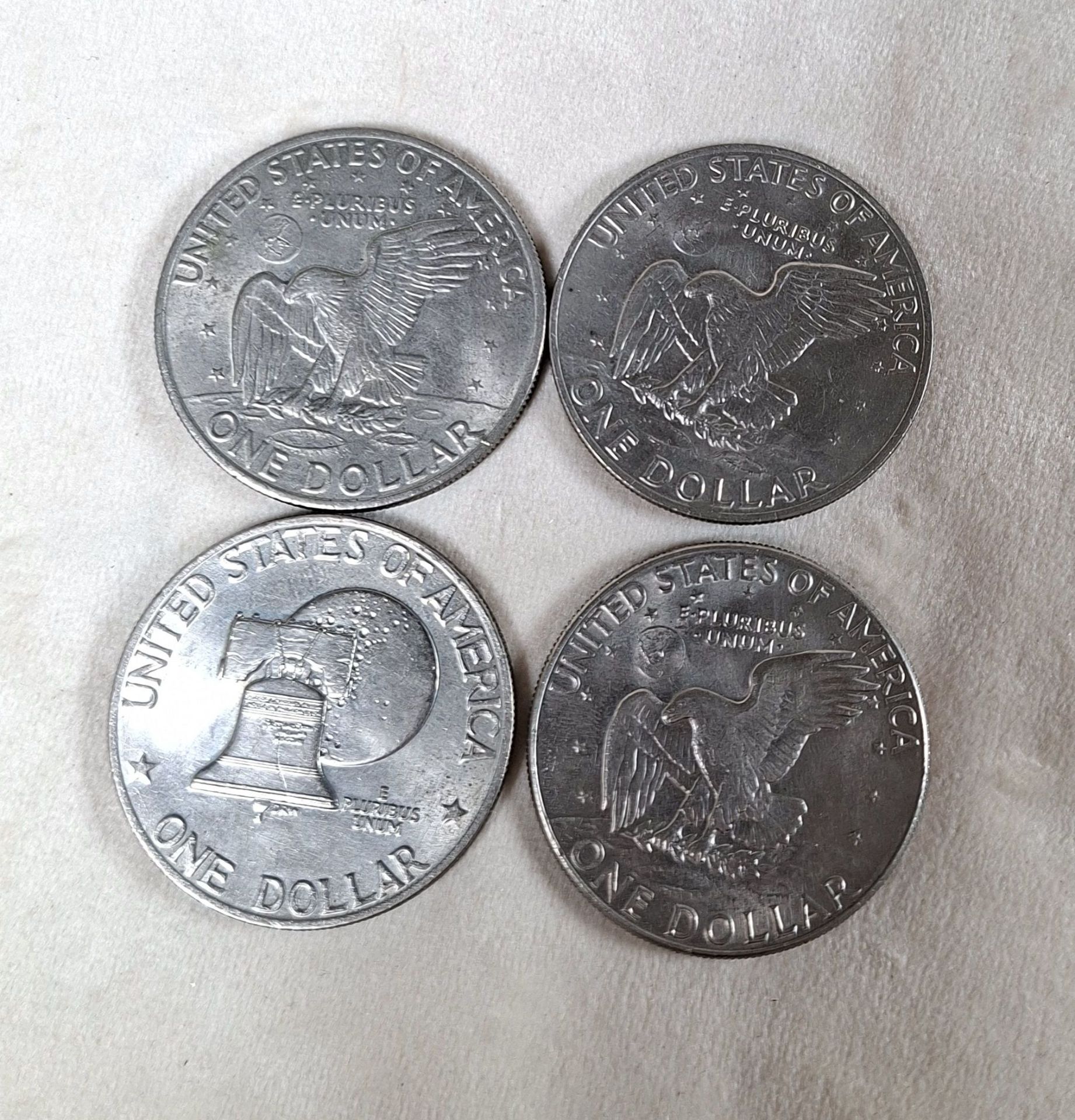 Four Eisenhower One Dollar Coins - image 1 of 5