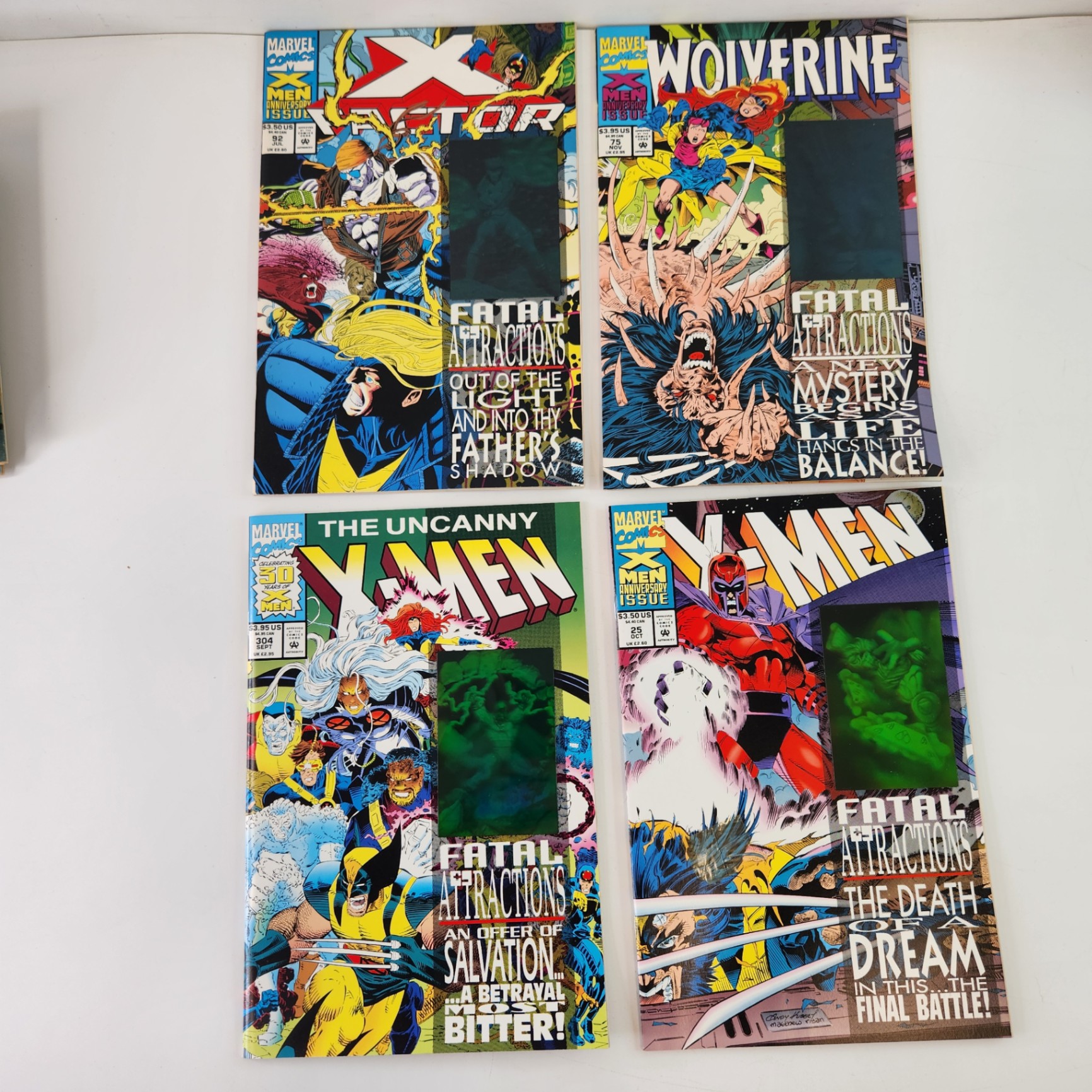 Marvel X-Men Anniversary Issues #25, UXM #304, Wolverine #75, X Factor #92 - image 1 of 4