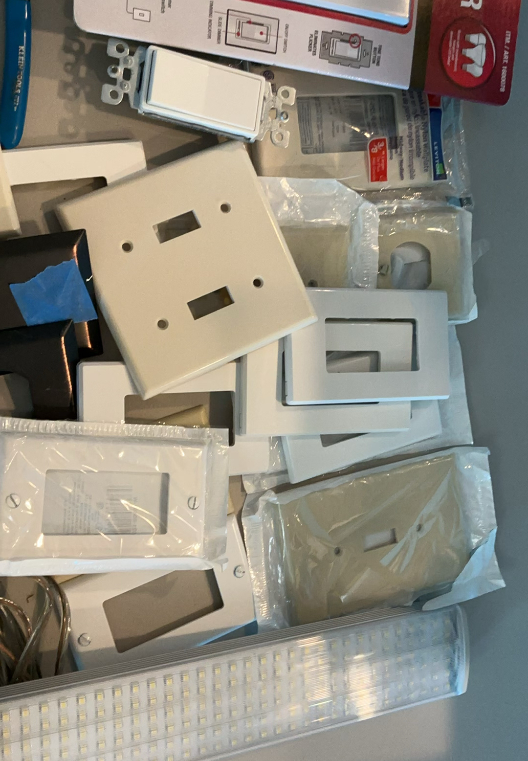 Assorted lighting switches, dimmers, wall plates, and wiring hardware - image 2 of 5