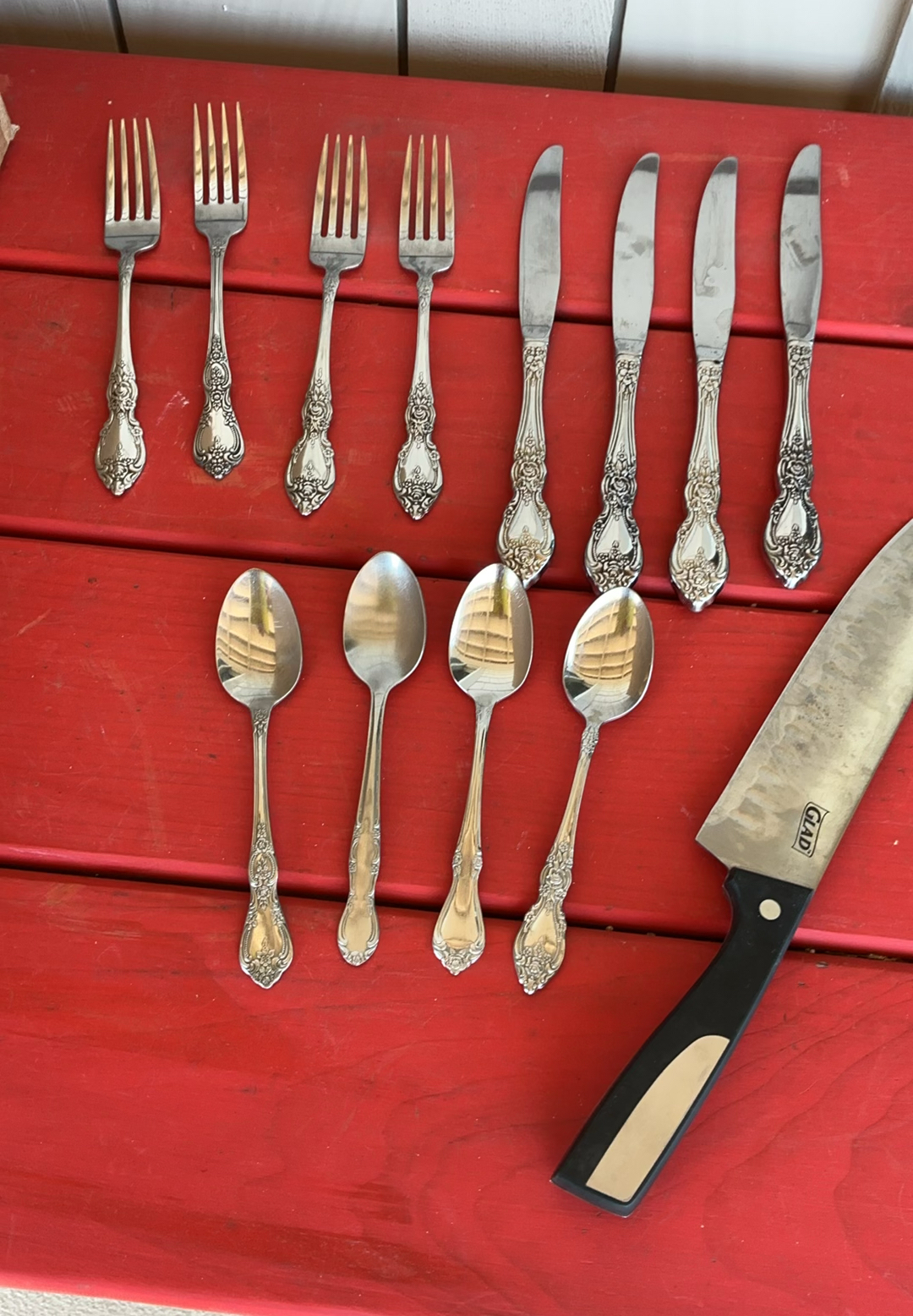 Vintage porcelain plates with floral rims, metal serving trays, egg tray, and ornate flatware set - image 9 of 13
