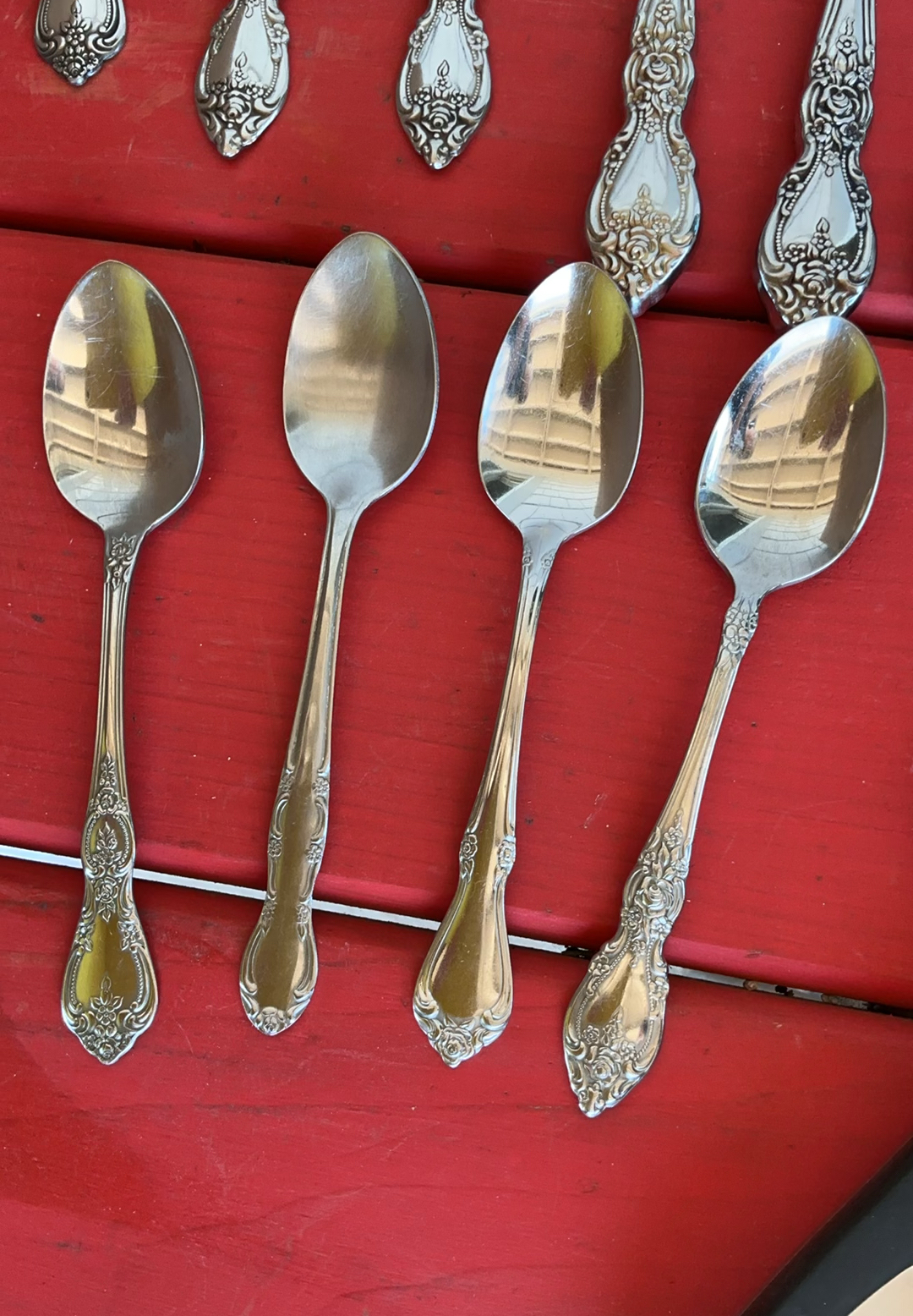 Vintage porcelain plates with floral rims, metal serving trays, egg tray, and ornate flatware set - image 12 of 13