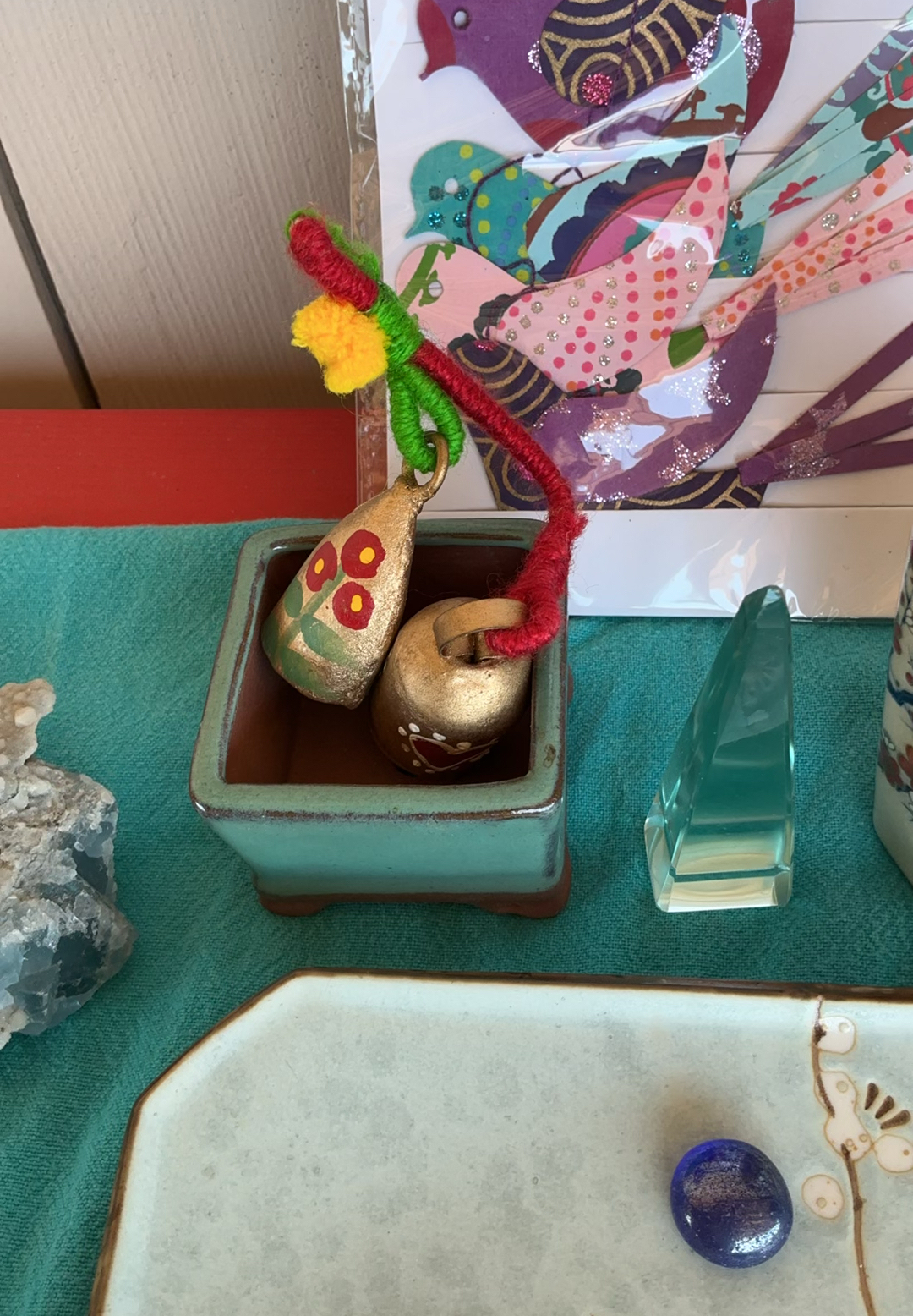 Assorted decorative Altar items: ceramics, artwork, crystals, and Tibetan prayer flags - image 3 of 9