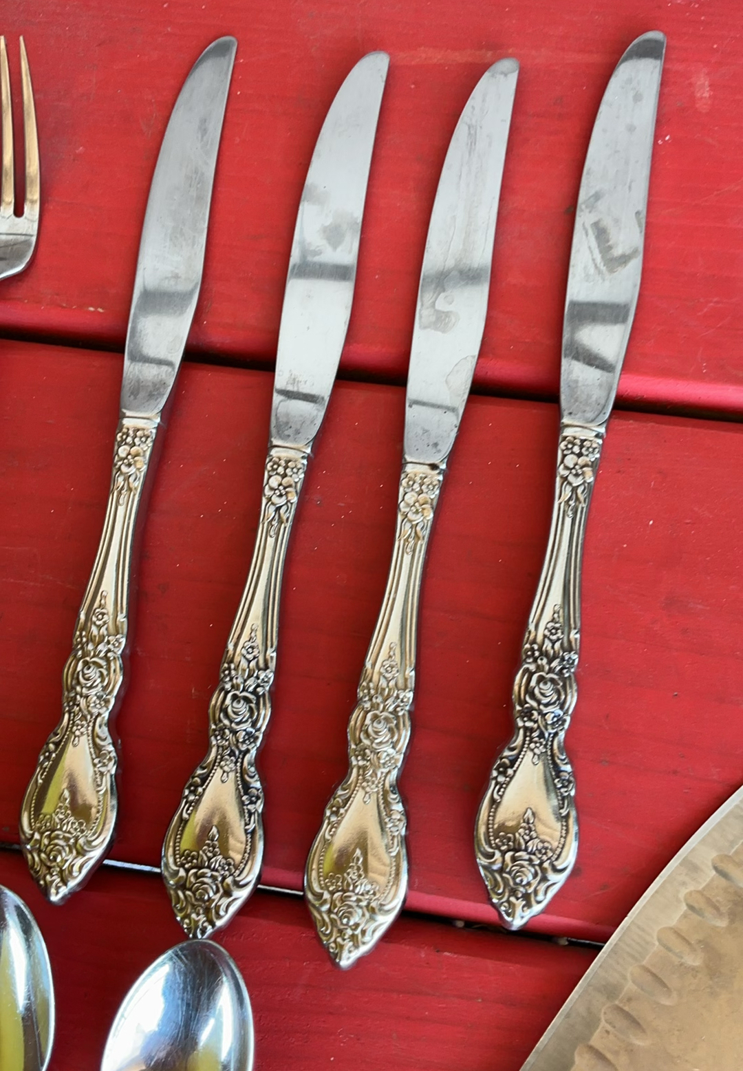 Vintage porcelain plates with floral rims, metal serving trays, egg tray, and ornate flatware set - image 10 of 13
