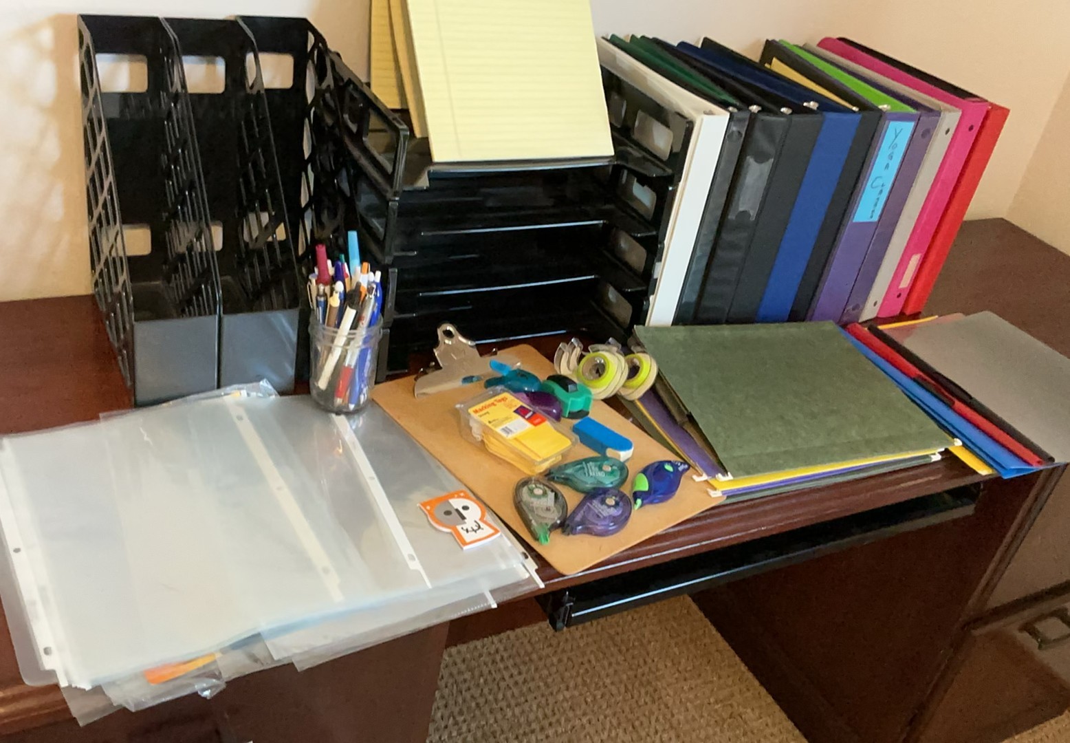 Office organization with binders, folders, and desk supplies - image 1 of 5