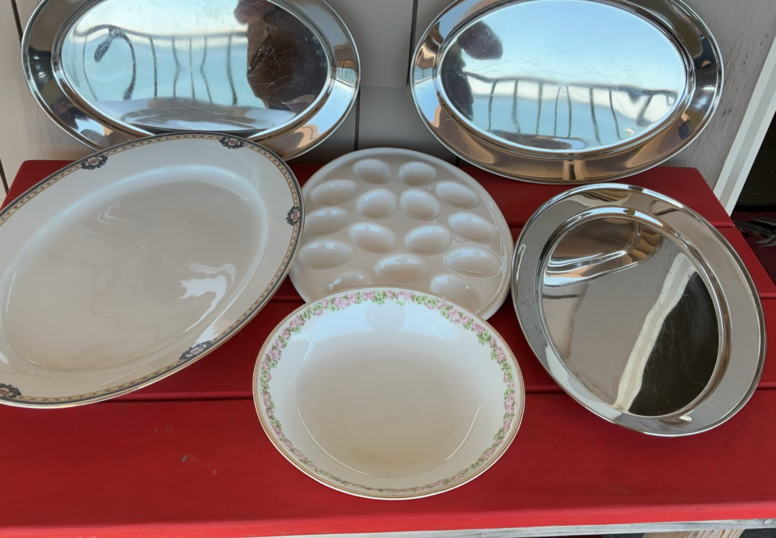 Vintage porcelain plates with floral rims, metal serving trays, egg tray, and ornate flatware set - image 1 of 13