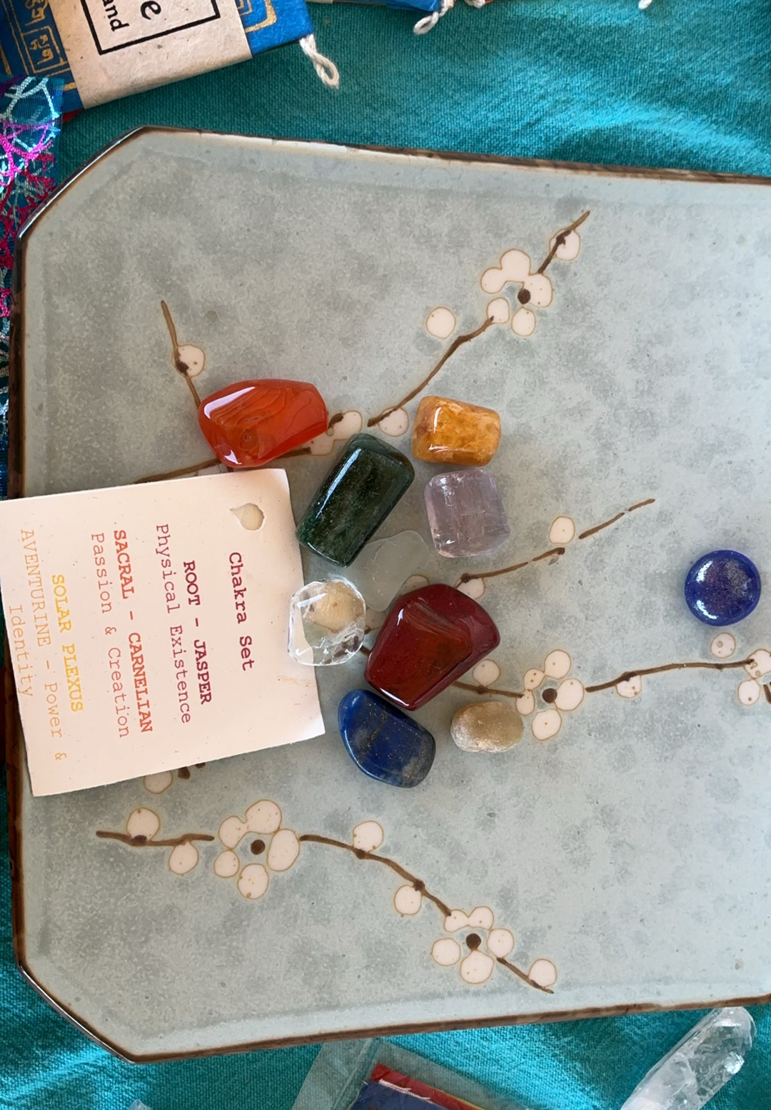 Assorted decorative Altar items: ceramics, artwork, crystals, and Tibetan prayer flags - image 5 of 9