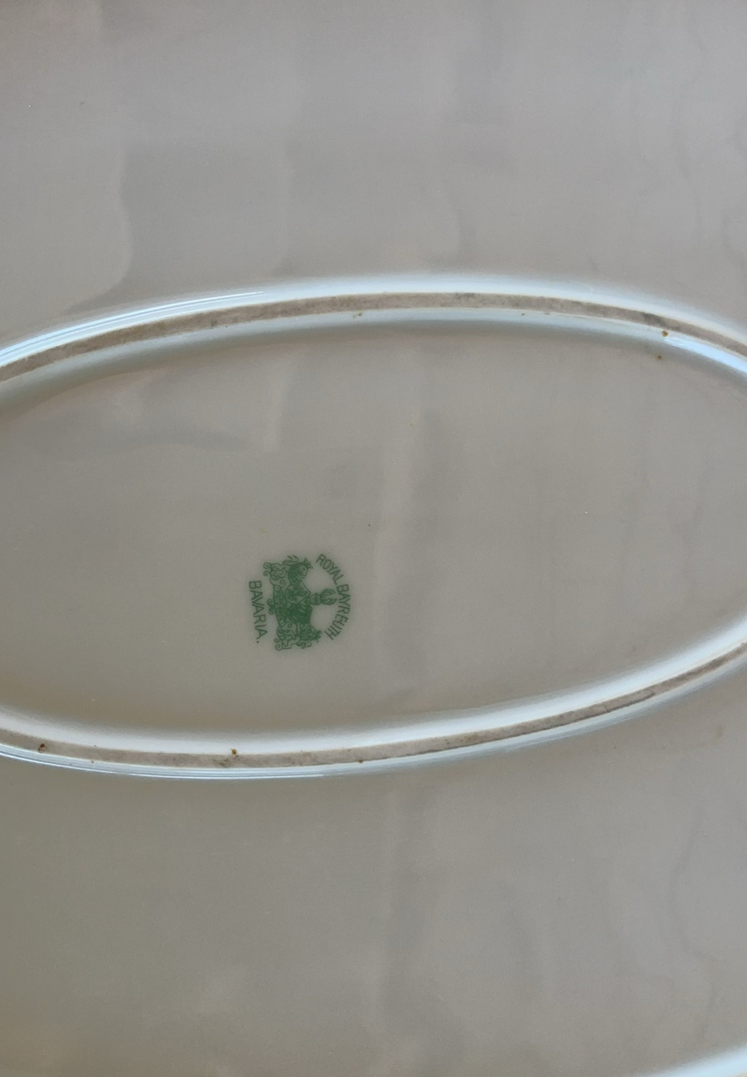 Vintage porcelain plates with floral rims, metal serving trays, egg tray, and ornate flatware set - image 3 of 13