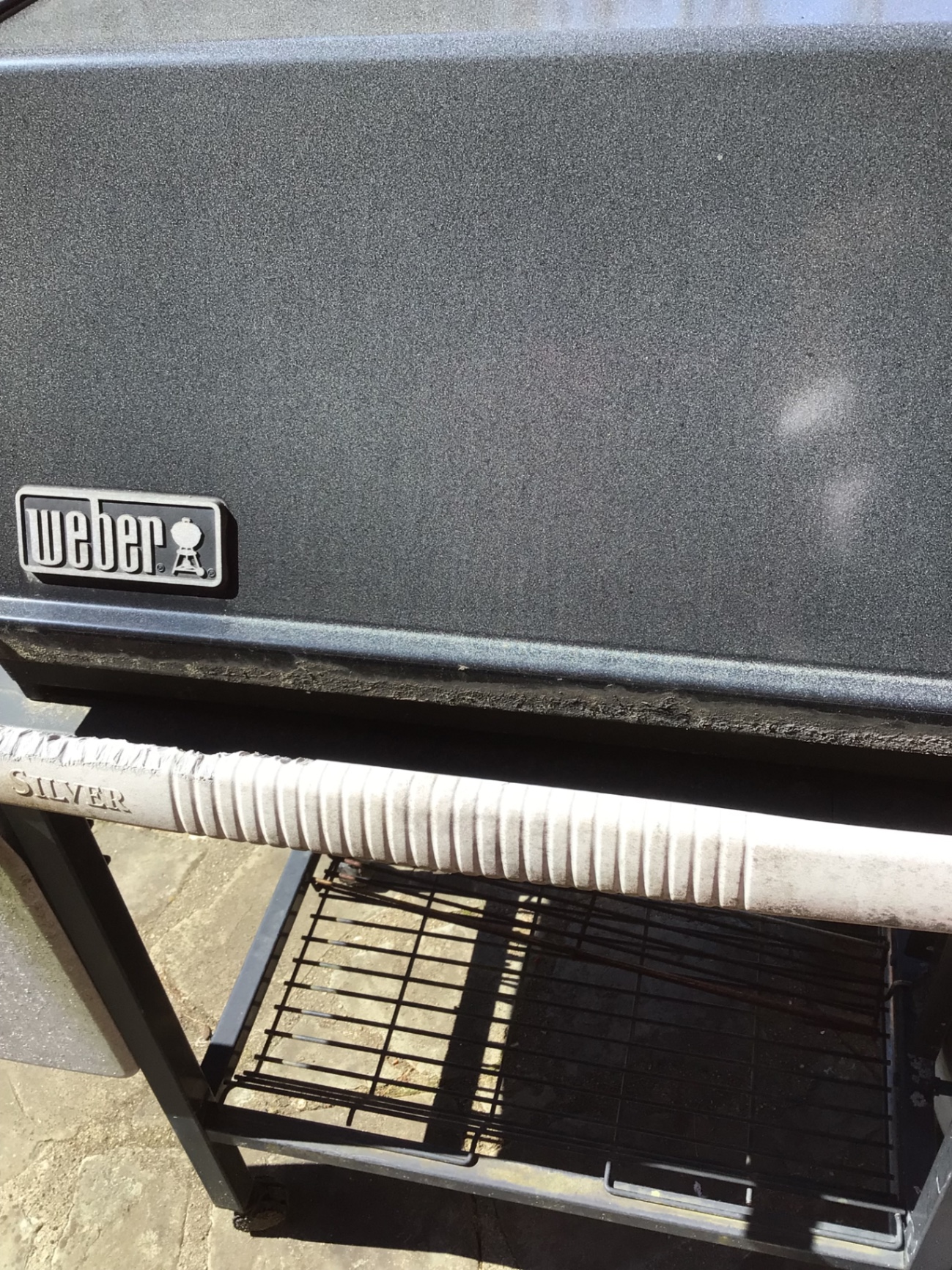 Weber gas grill on a wheeled cart with propane tank - image 3 of 4