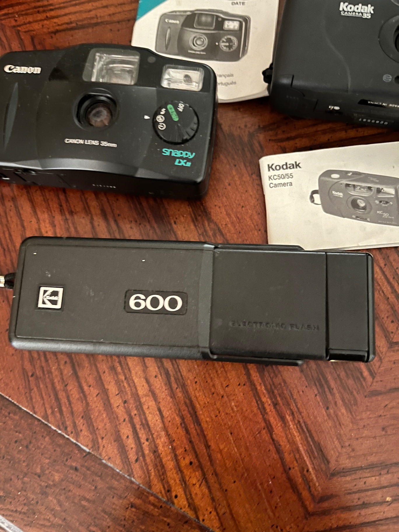 Vintage 35mm film cameras and accessories - image 2 of 2