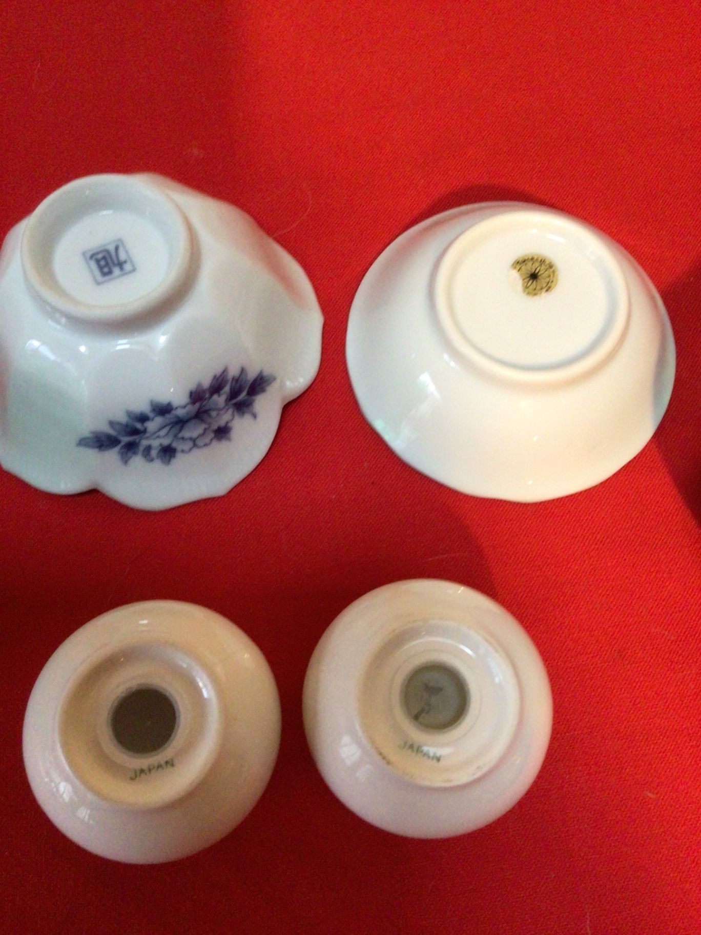 Blue-and-white porcelain bowls, salt-and-pepper shakers, and green glass mugs - image 3 of 4