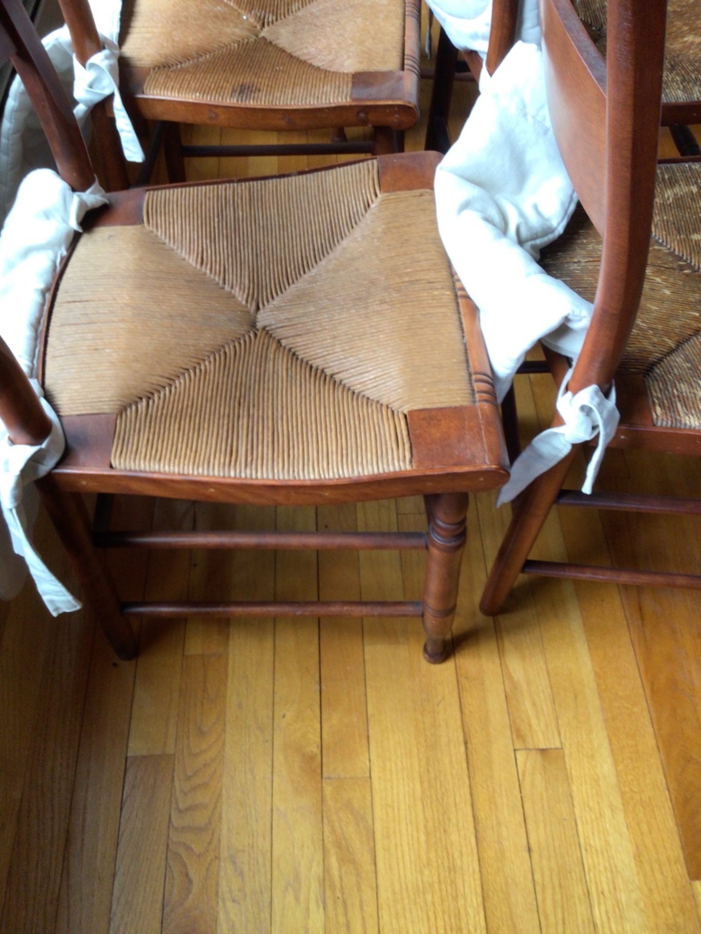 Wooden dining chairs with woven cane seats - image 6 of 6