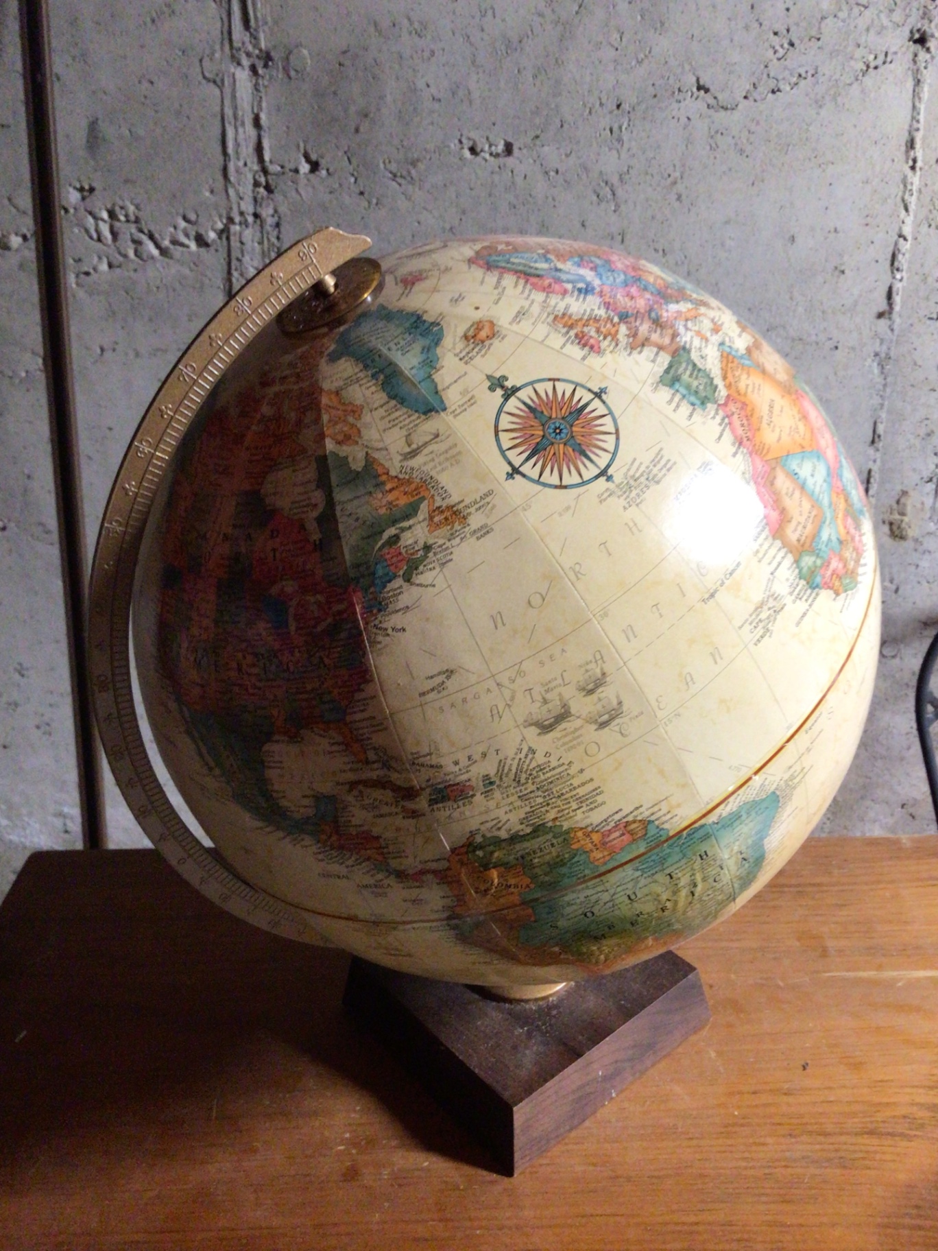Globe on wooden stand with meridian ring - image 1 of 2