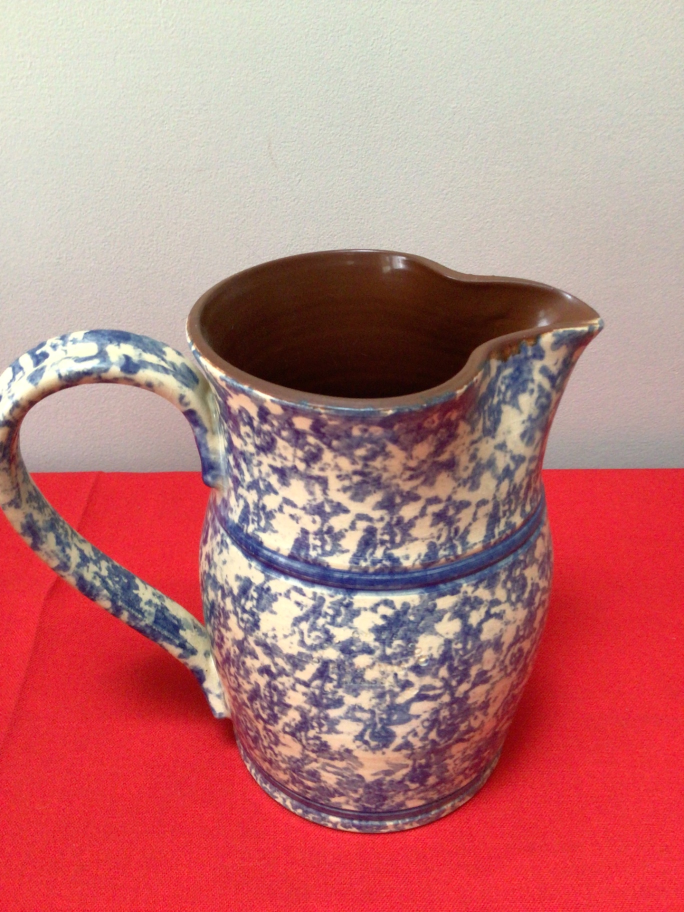 Blue and white speckled ceramic pitcher - image 1 of 3