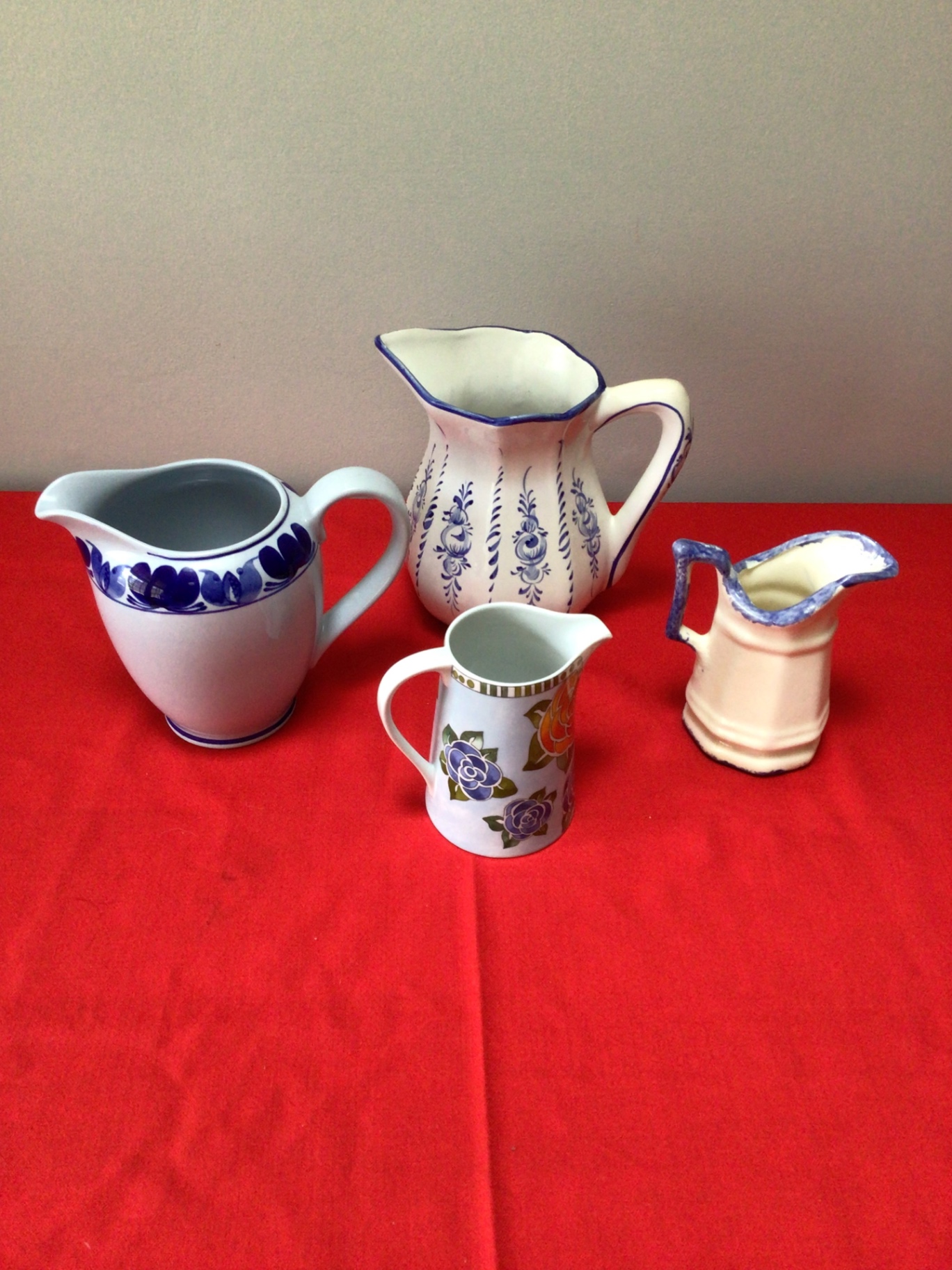 Assorted ceramic pitchers and a floral mug - image 2 of 3