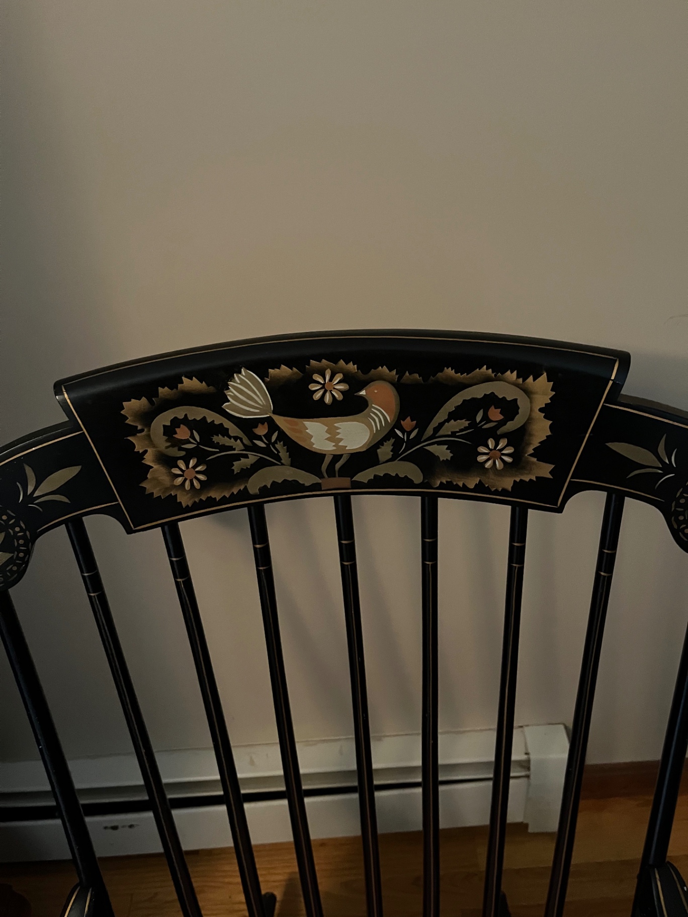 Black wooden rocking chair with heart-shaped plaid cushion - image 2 of 2