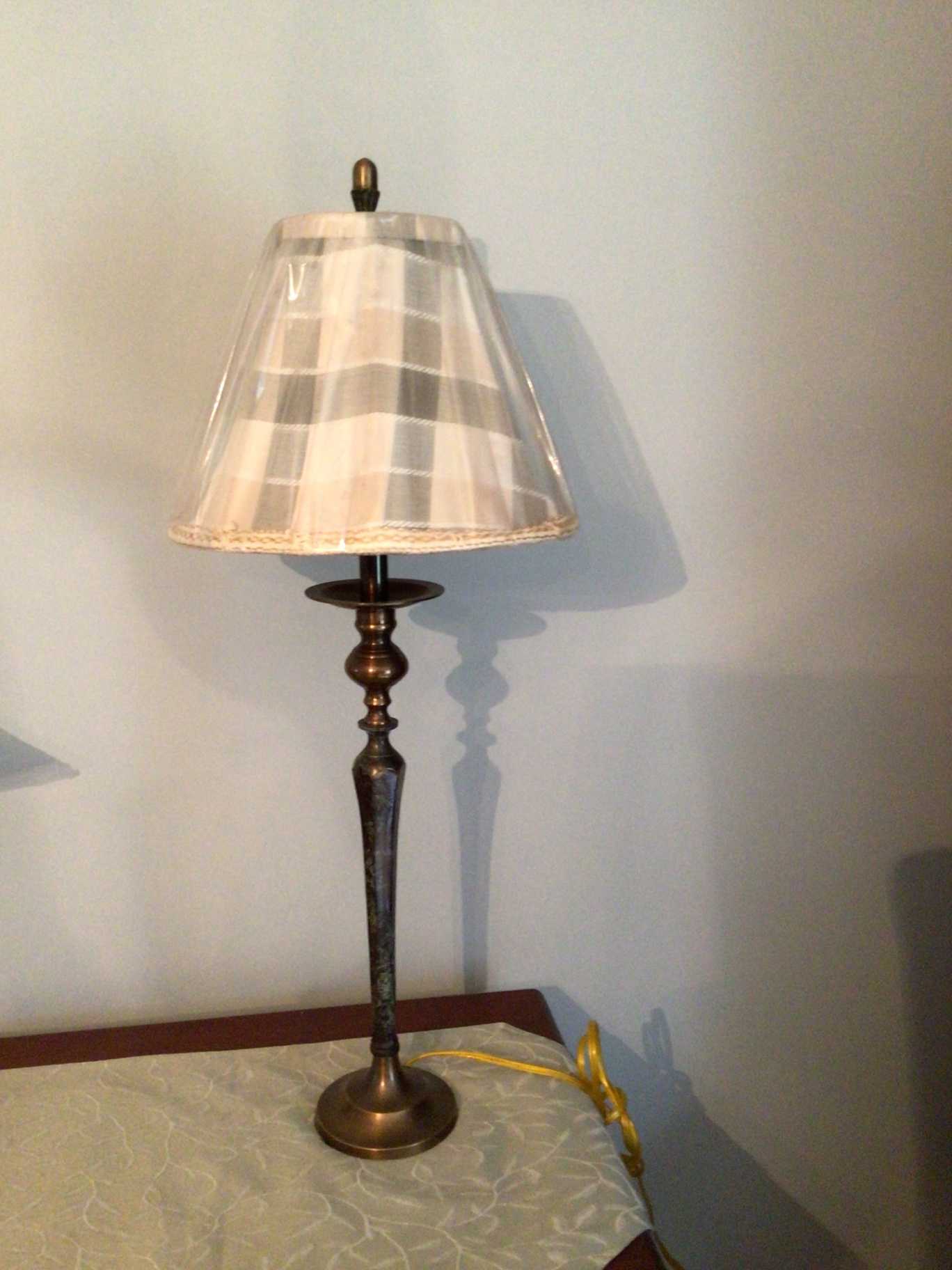 Antique brass table lamp with striped shade - image 1 of 3