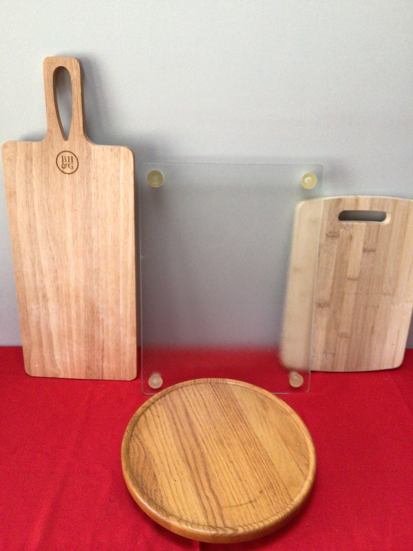 Wooden cutting boards, a round serving/trivet disk, and a frosted glass panel - image 1 of 2