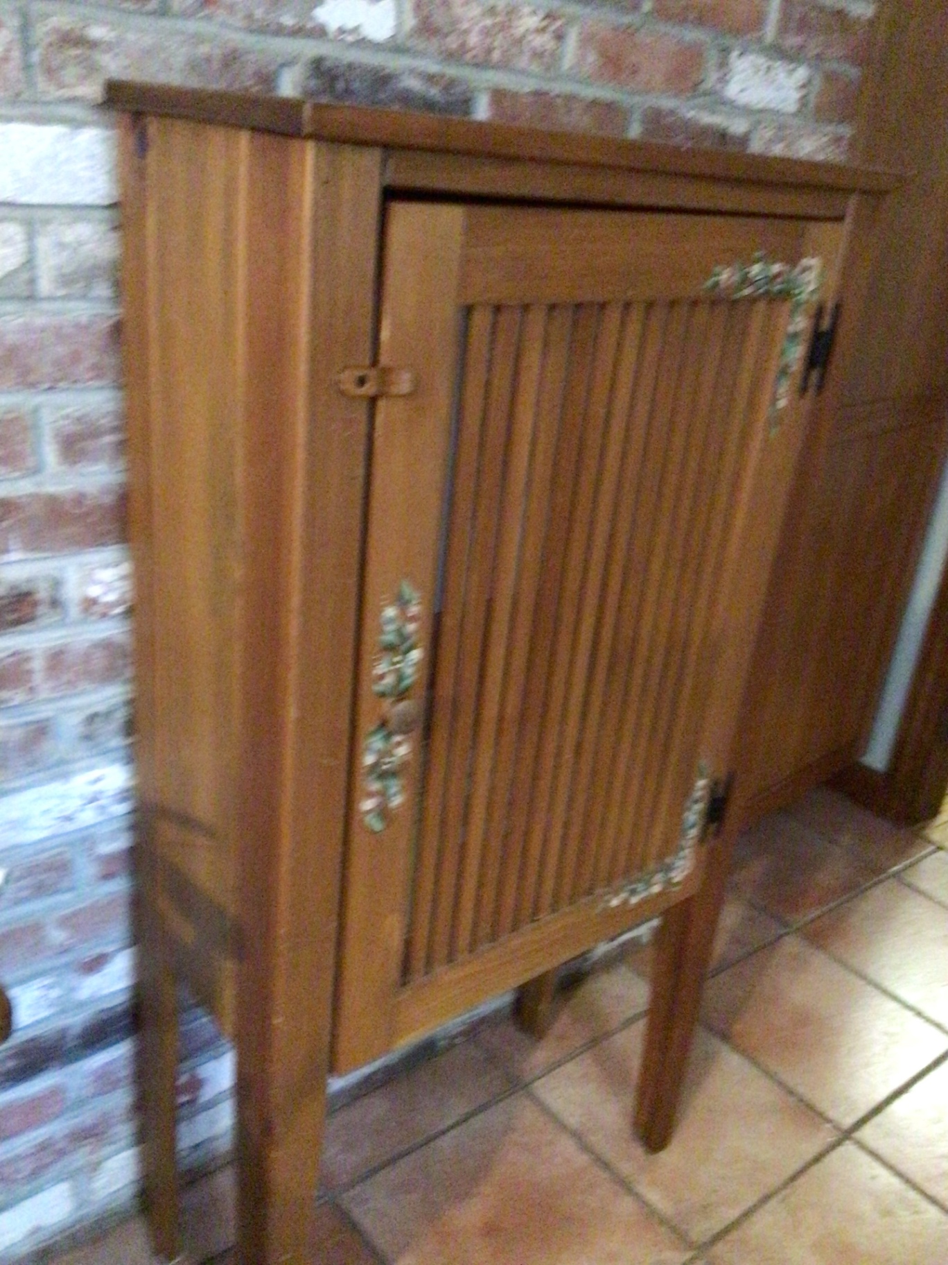 Wooden cabinet with slatted vent-style door - image 2 of 3