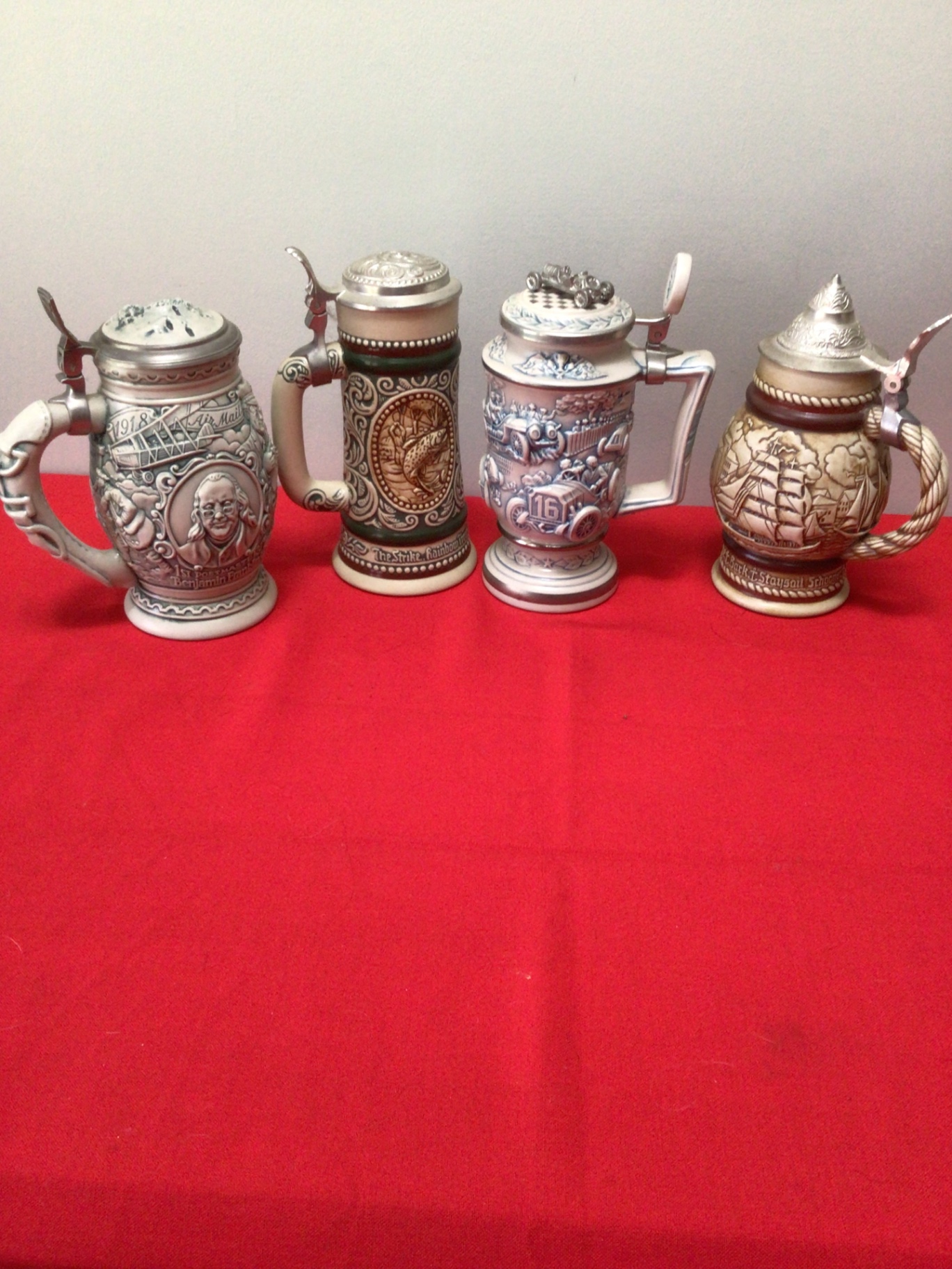 Set of five decorative ceramic beer steins with pewter lids - image 1 of 10