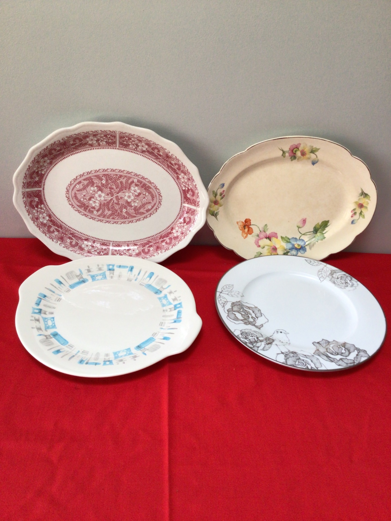 Set of four ceramic dinner plates with assorted patterns - image 1 of 3