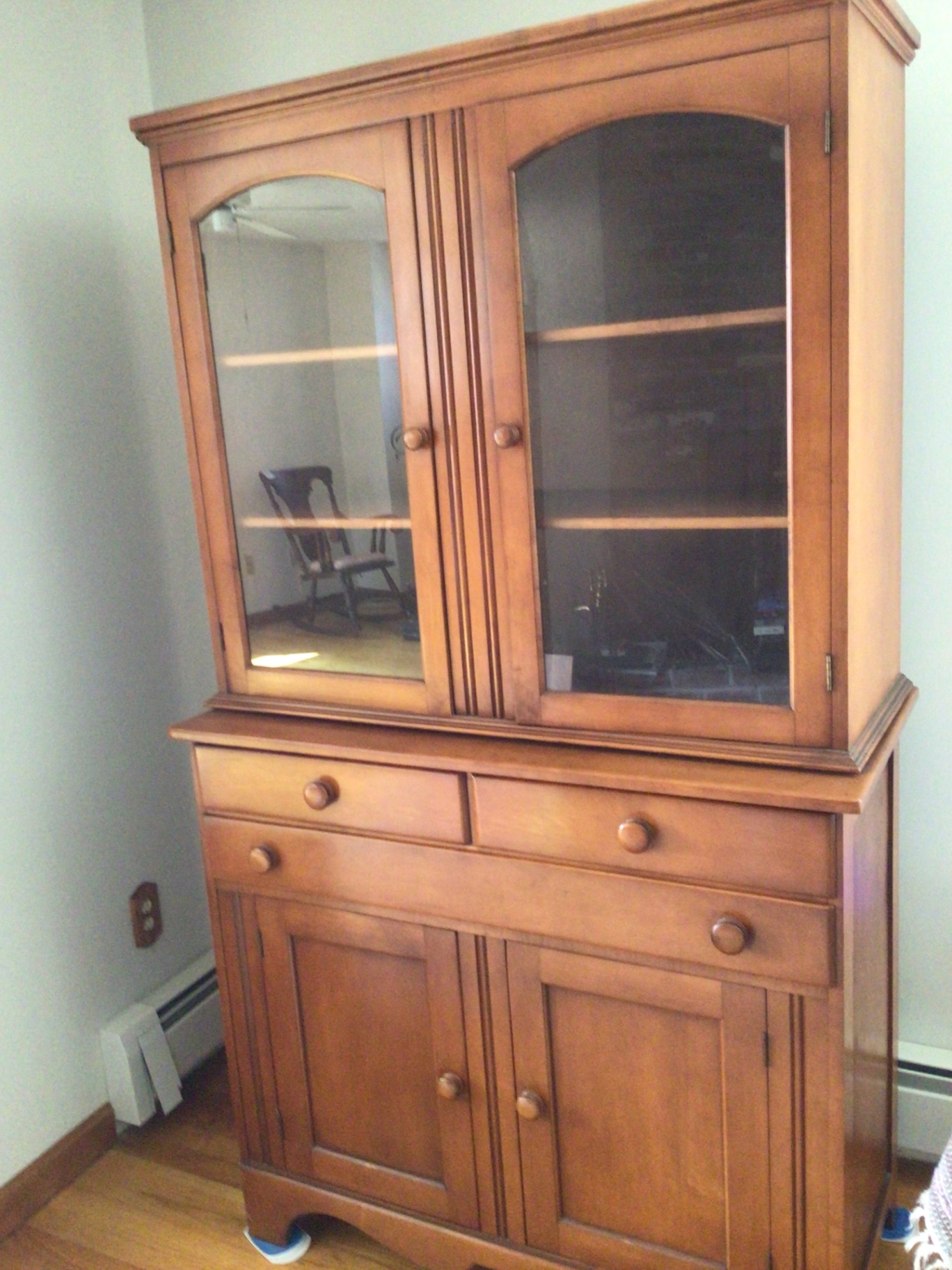 Wooden china cabinet with glass-front upper section and lower storage - image 2 of 3