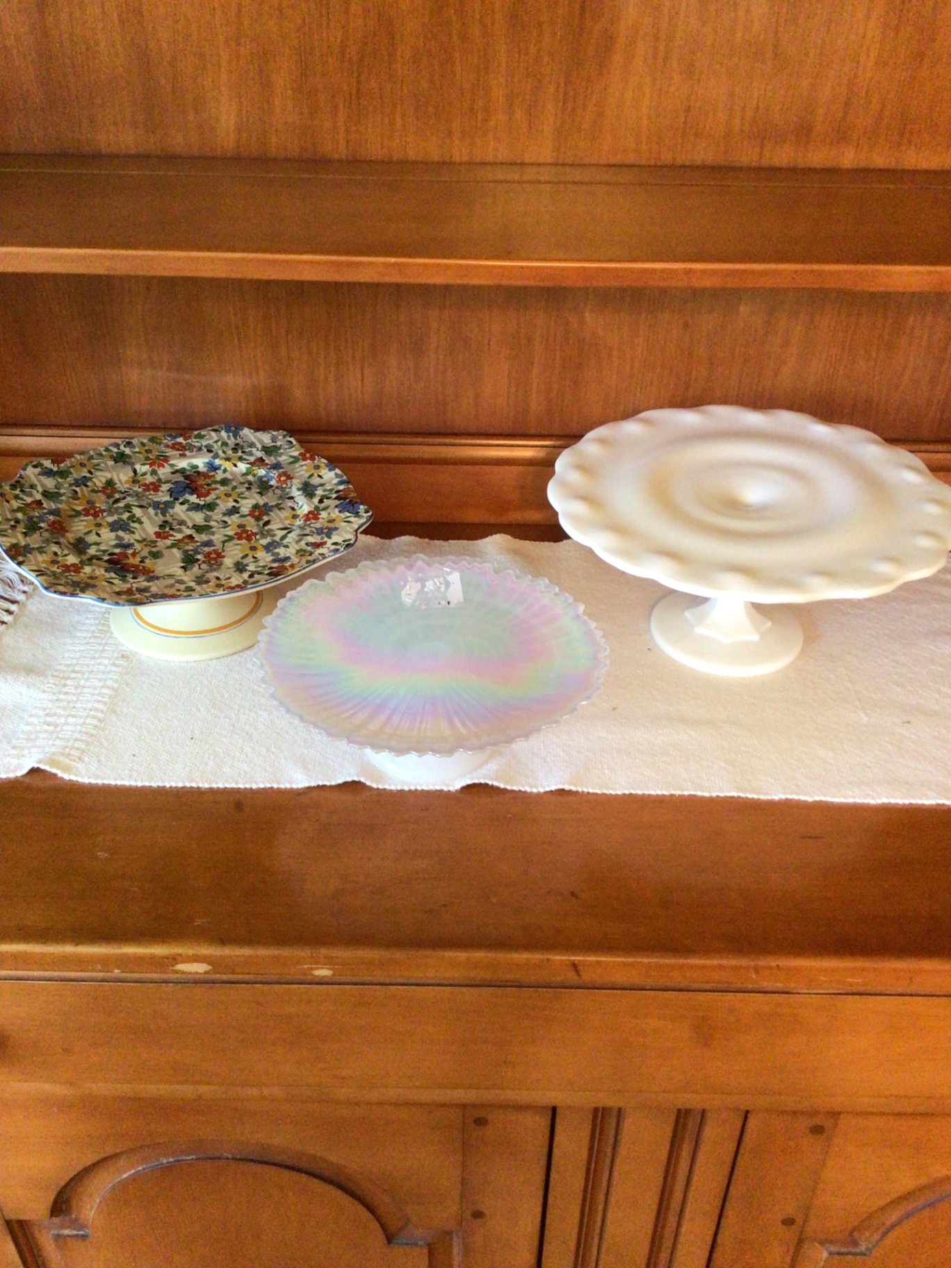 Floral patterned plate on pedestal, iridescent glass plate, and white pedestal cake stand - image 1 of 5