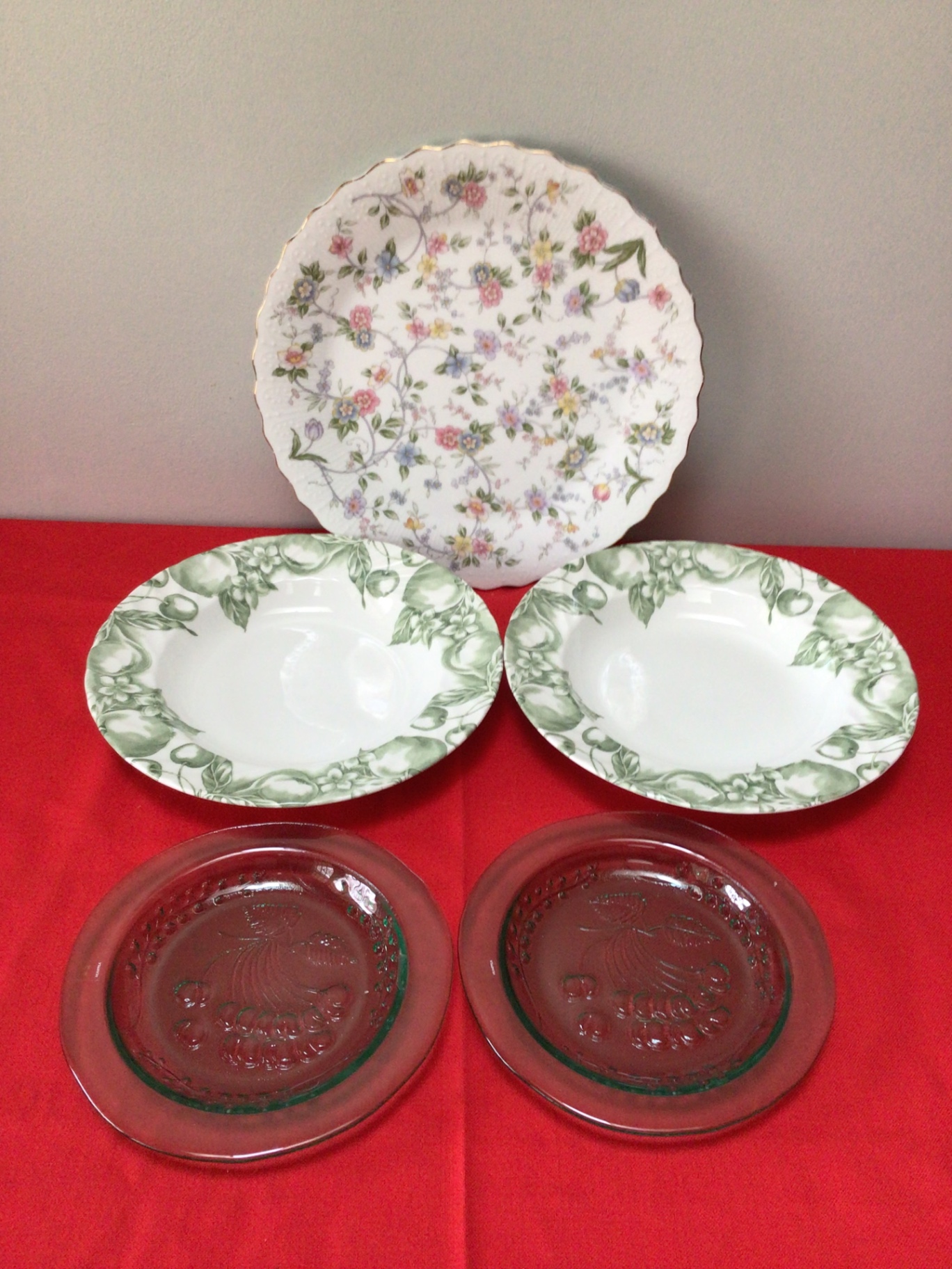 Floral patterned plate with green-bordered bowls and red glass dessert plates - image 1 of 2