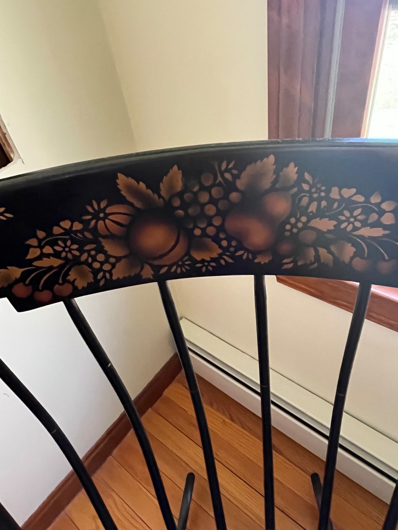 Black wooden rocking chair with floral back and woven cushion - image 2 of 2