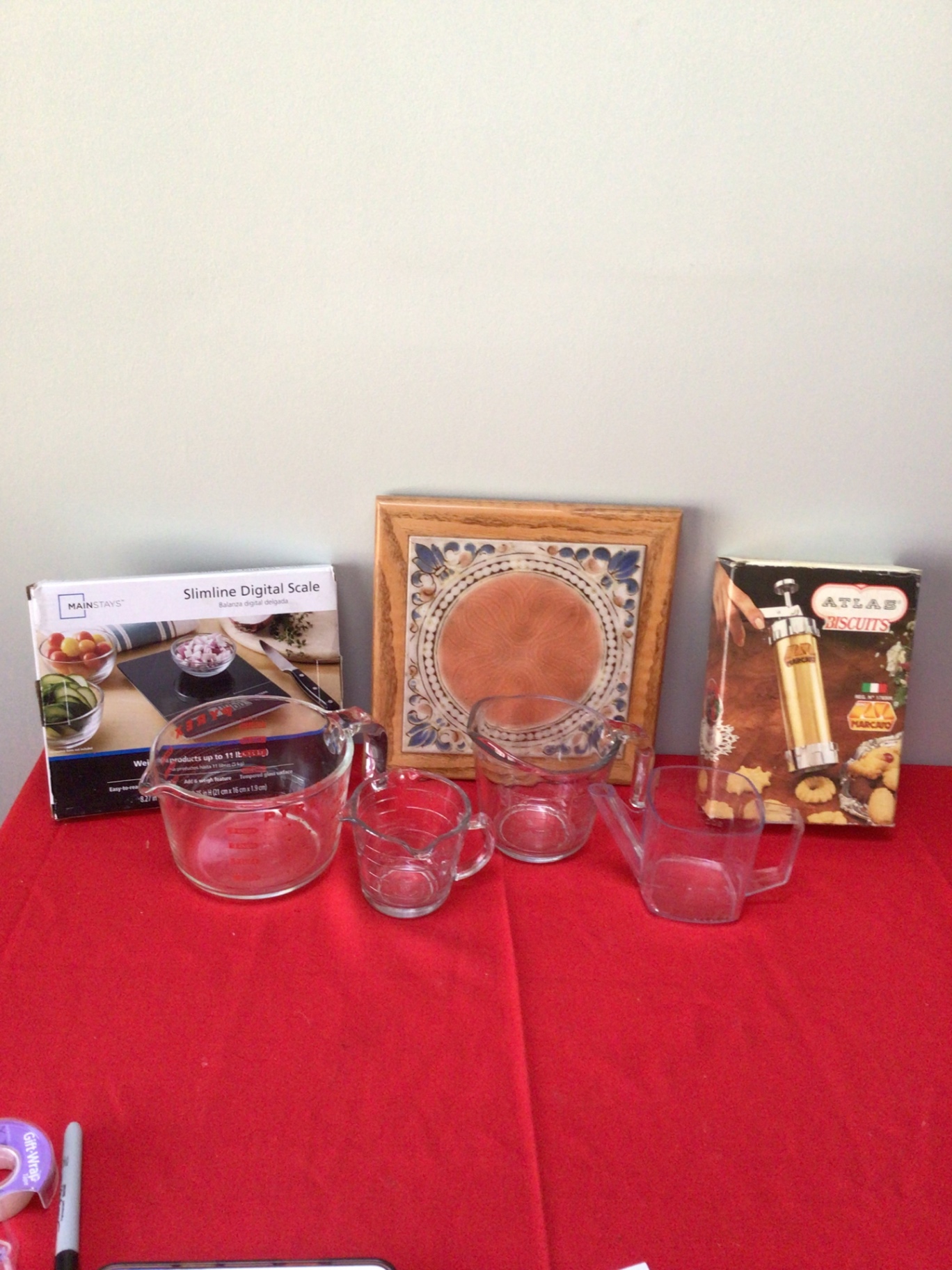 Glass measuring cups, digital scale box, and decorative tile art - image 1 of 3