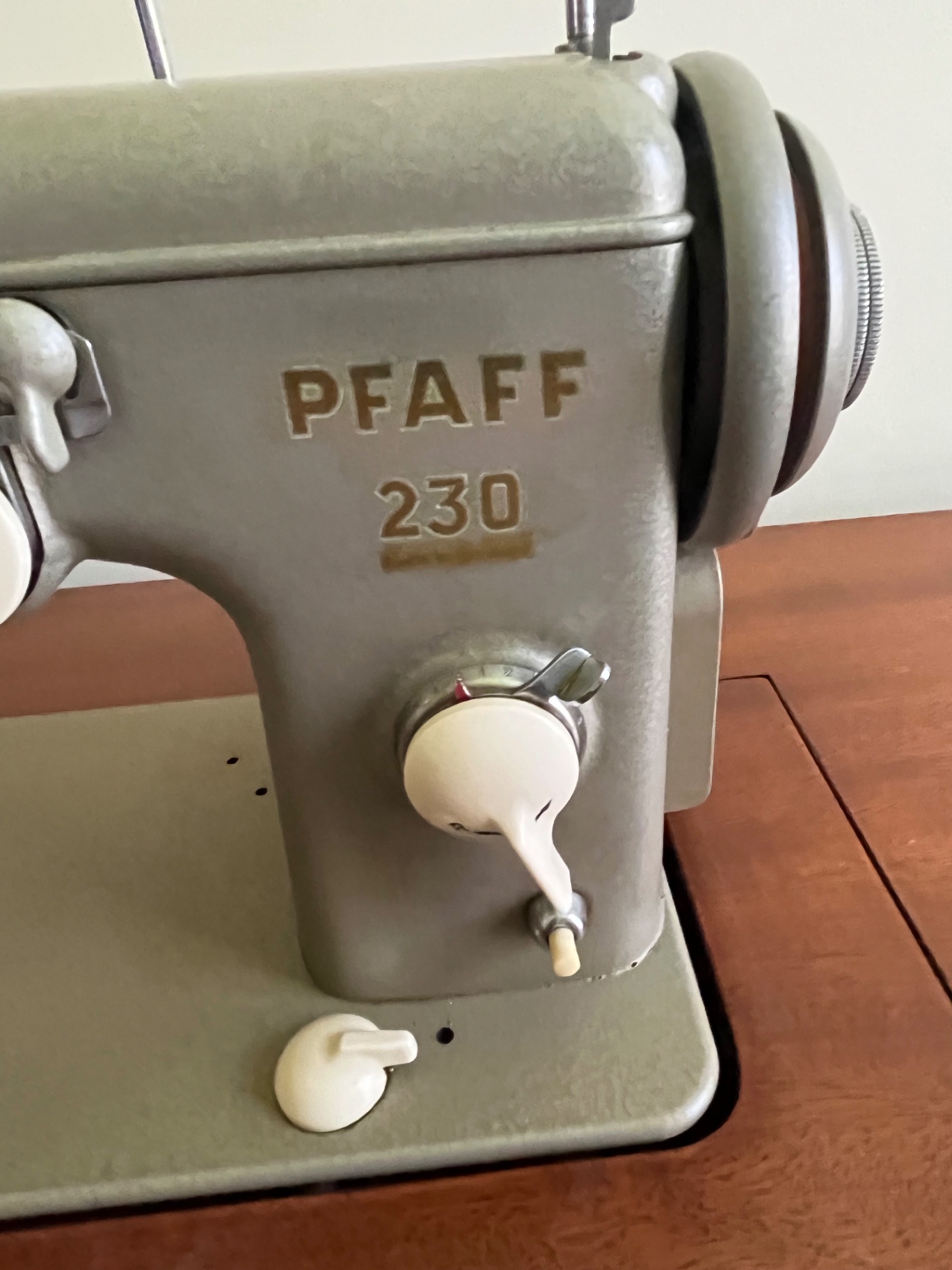 Vintage Pfaff 230 sewing machine on wooden desk - image 2 of 2