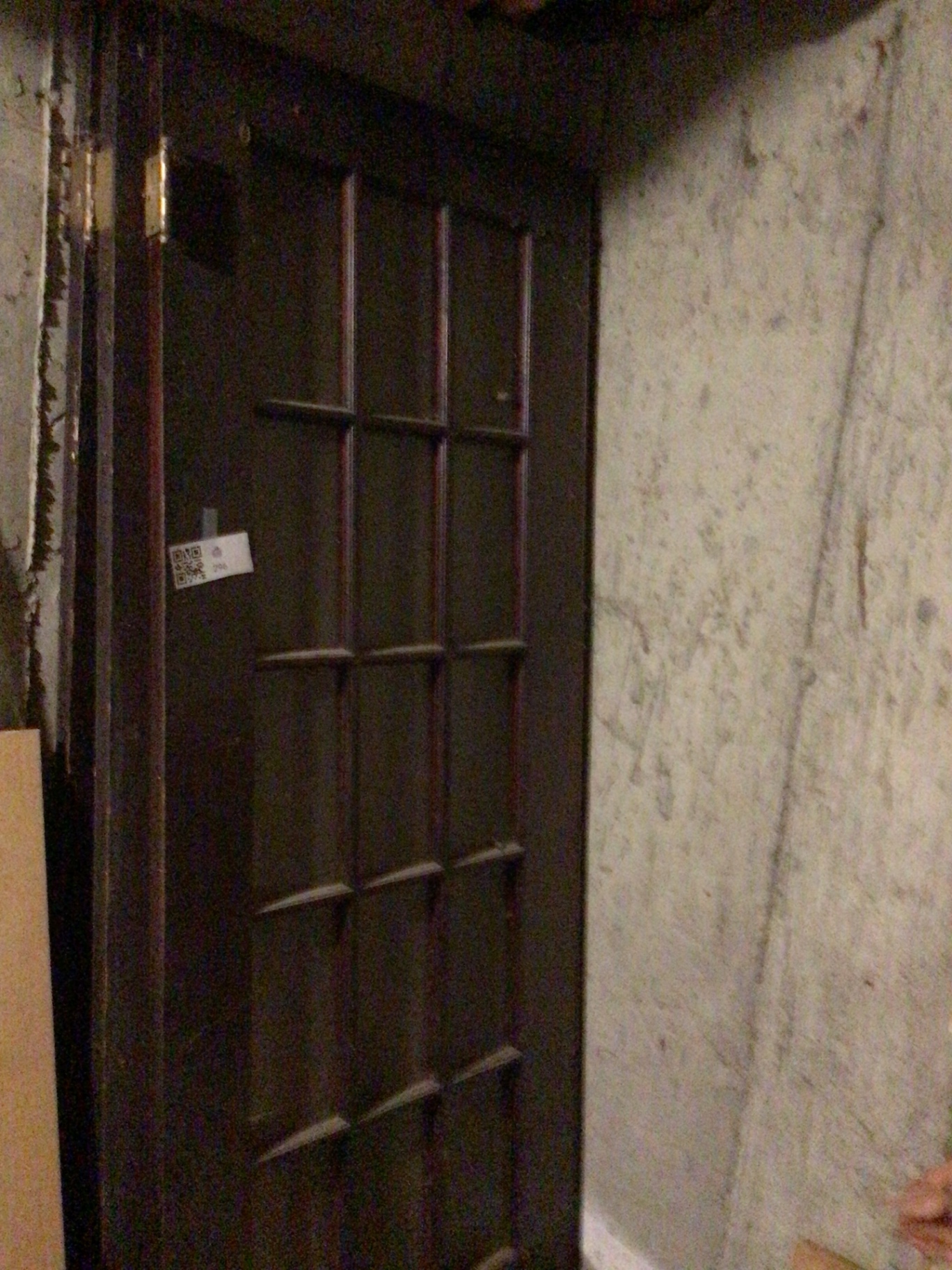 Tall dark wood grid-panel door - image 1 of 3