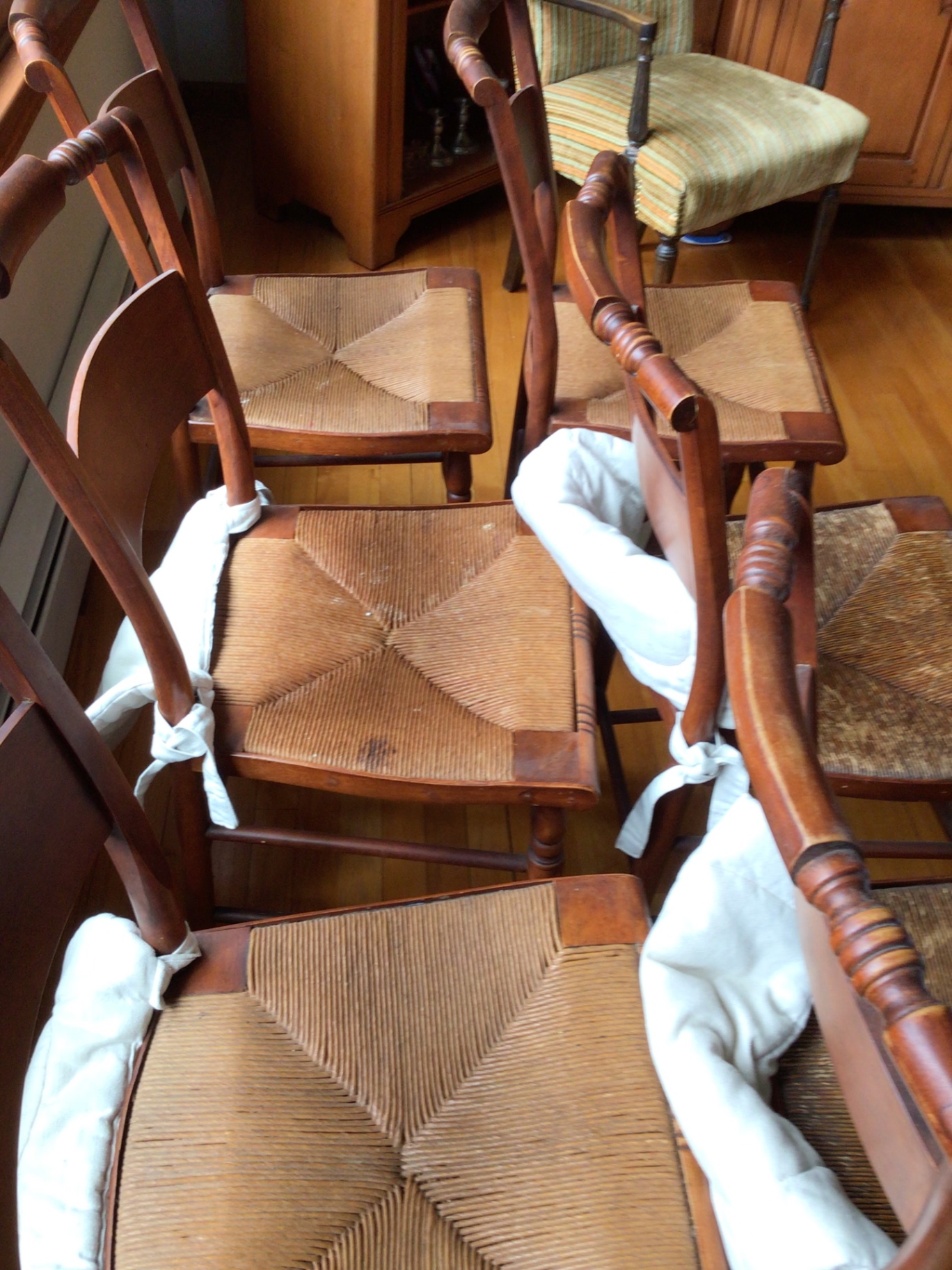 Wooden dining chairs with woven cane seats - image 5 of 6